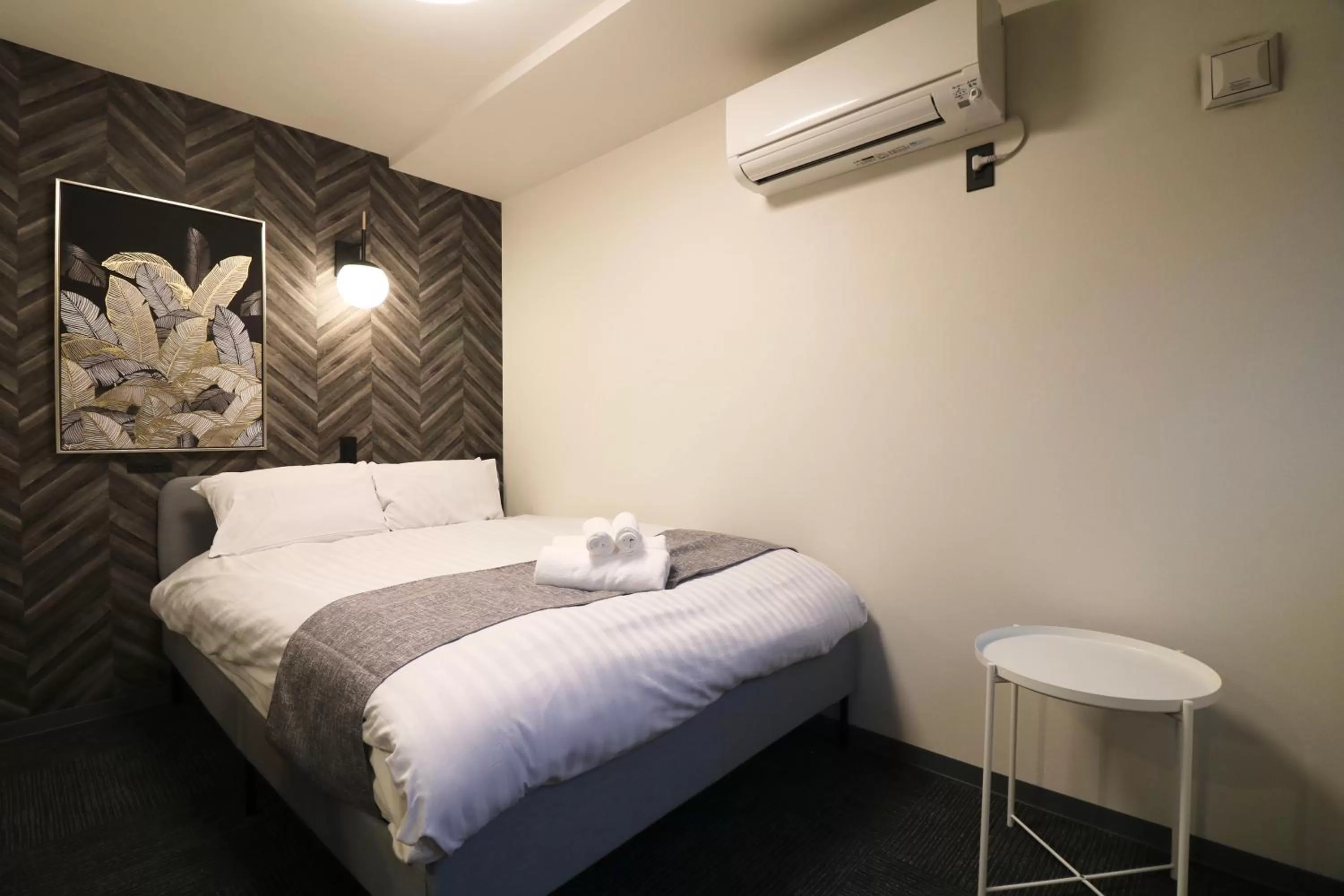 Bed in TAKETO STAY PREMIERE SAPPORO Eki