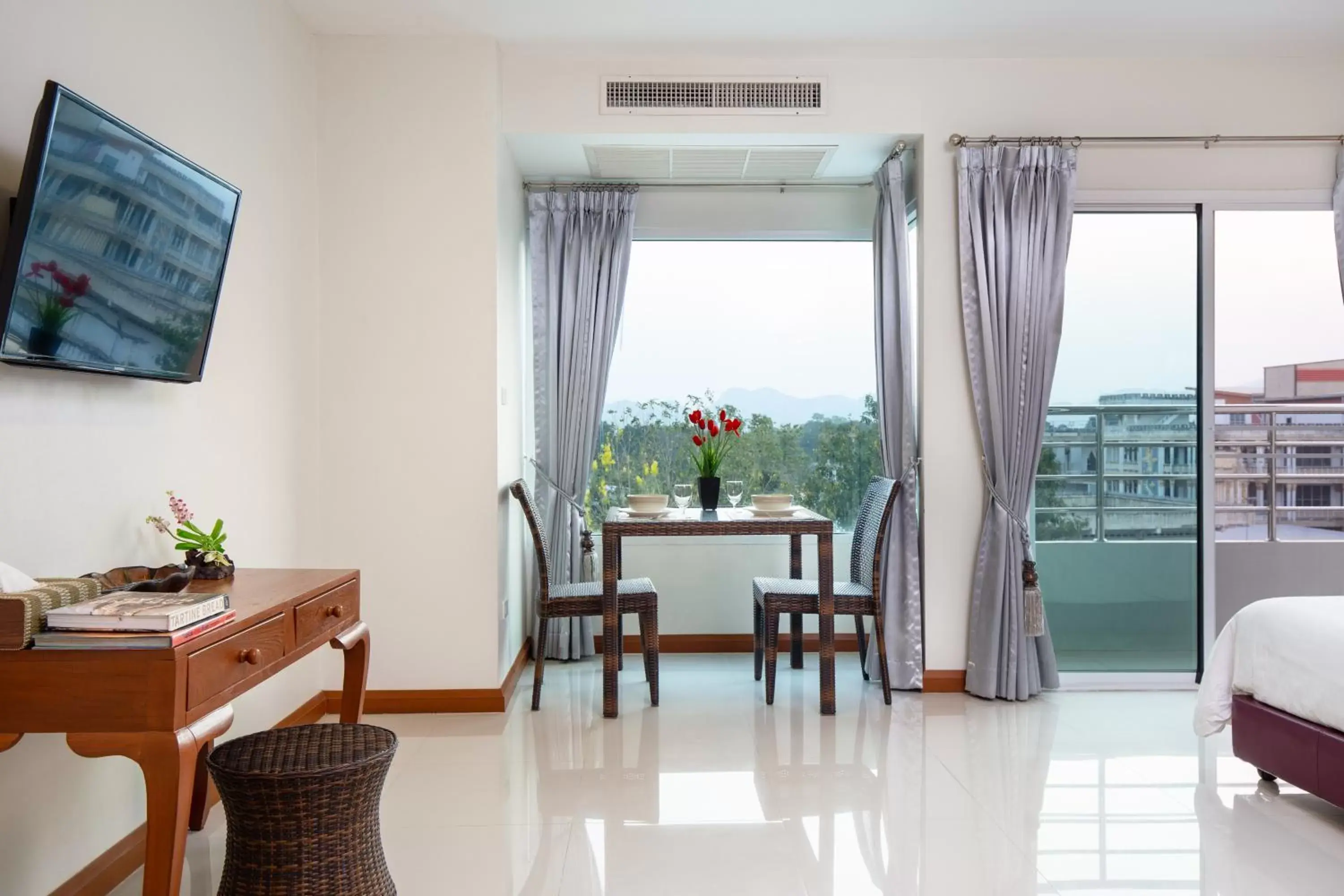 Bed, Dining Area in Kanchanaburi City Hotel - SHA Extra Plus