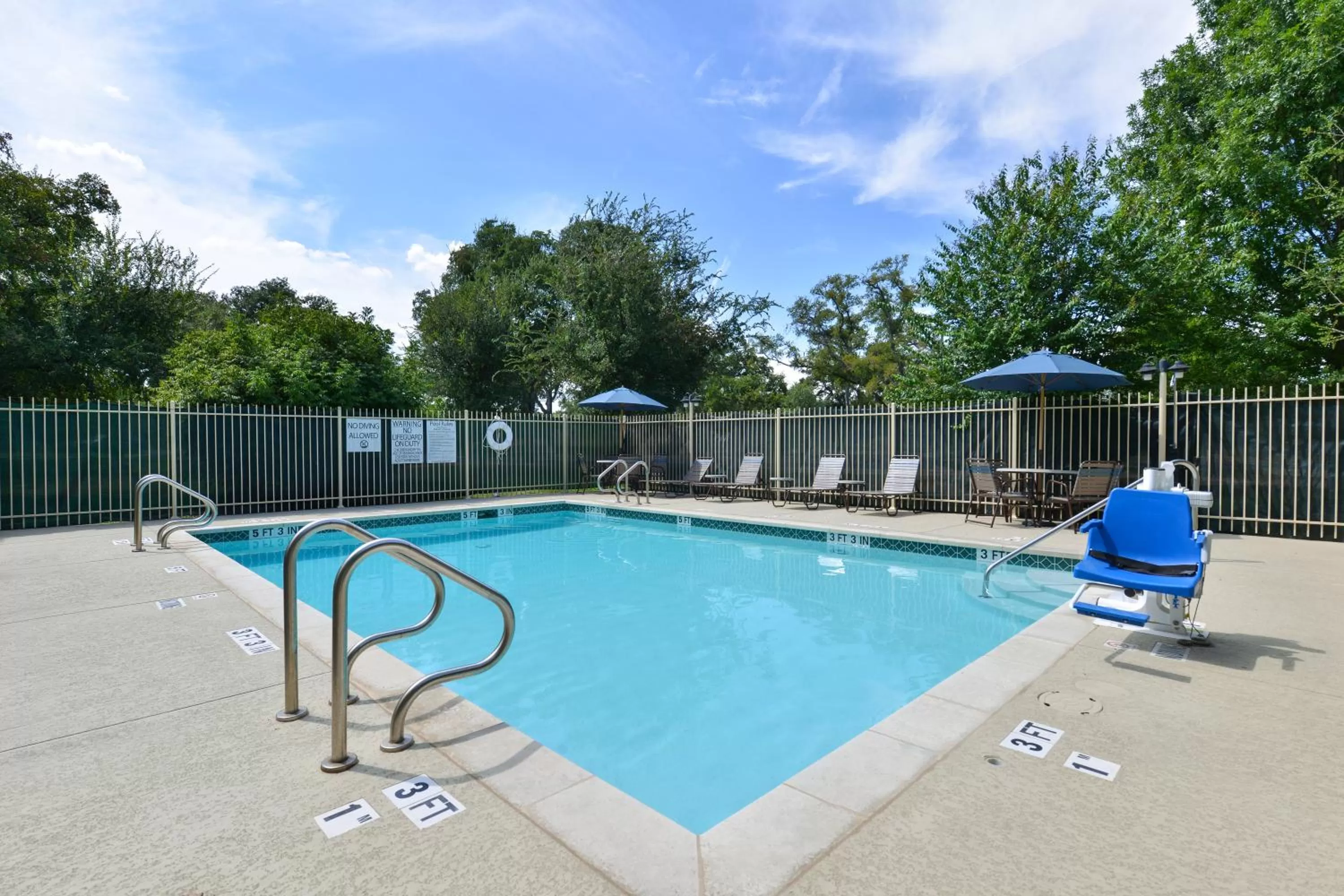 Swimming pool in Holiday Inn Express & Suites Austin SW - Sunset Valley by IHG Hotel