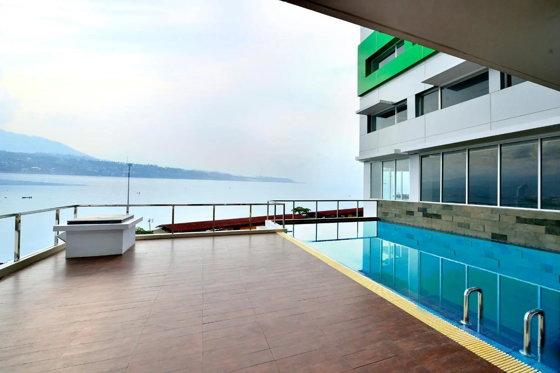 Day, Swimming Pool in Whiz Prime Hotel Megamas Manado