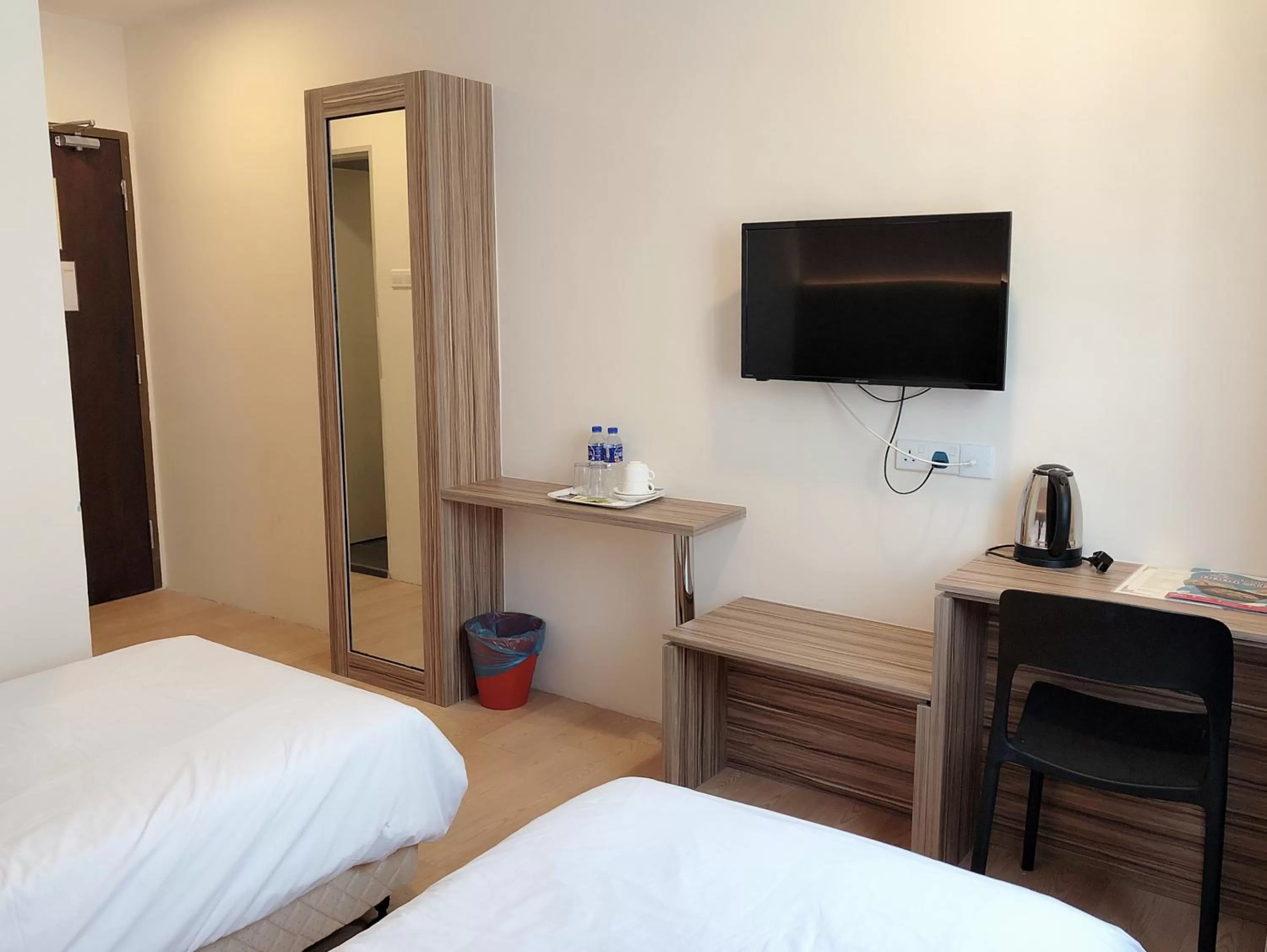 Bed in Tumike Hotel Bentong