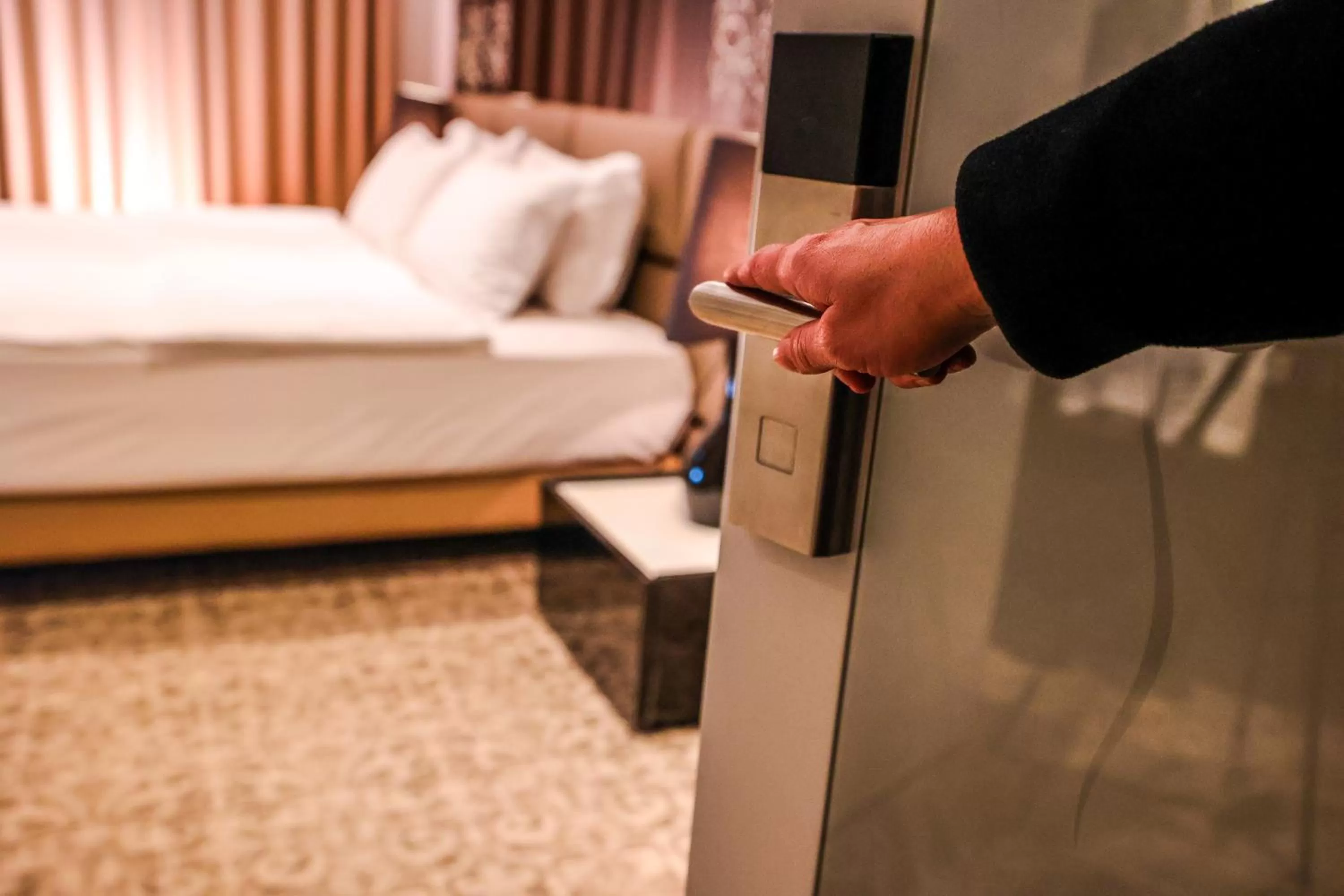 Bed in Senator Hotel