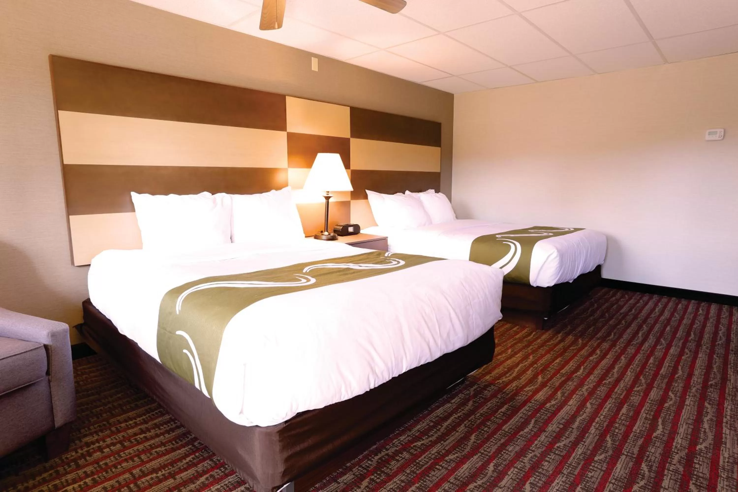 Bed in Quality Inn near Rocky Mountain National Park