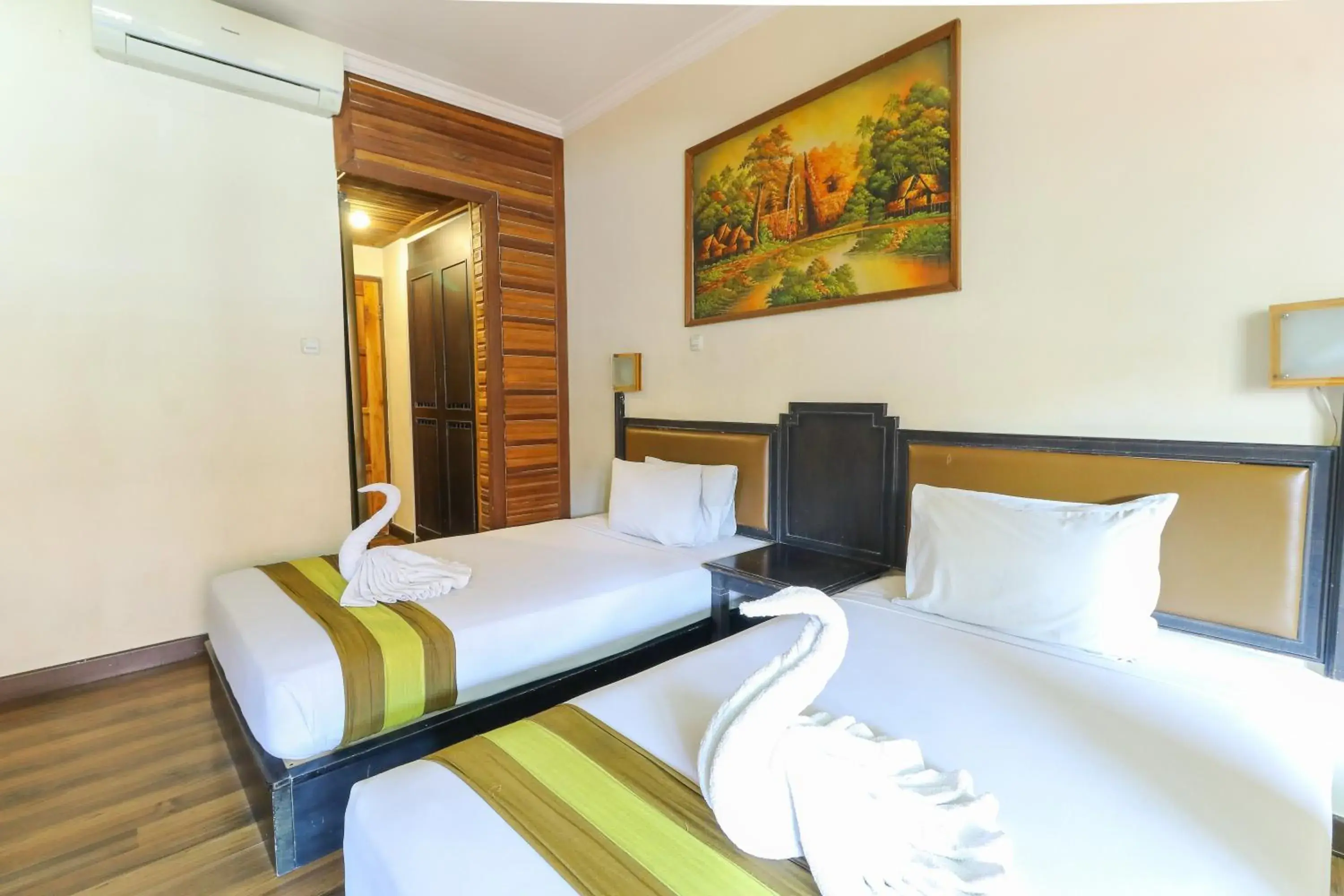 Bed in The Flora Kuta Bali Hotel