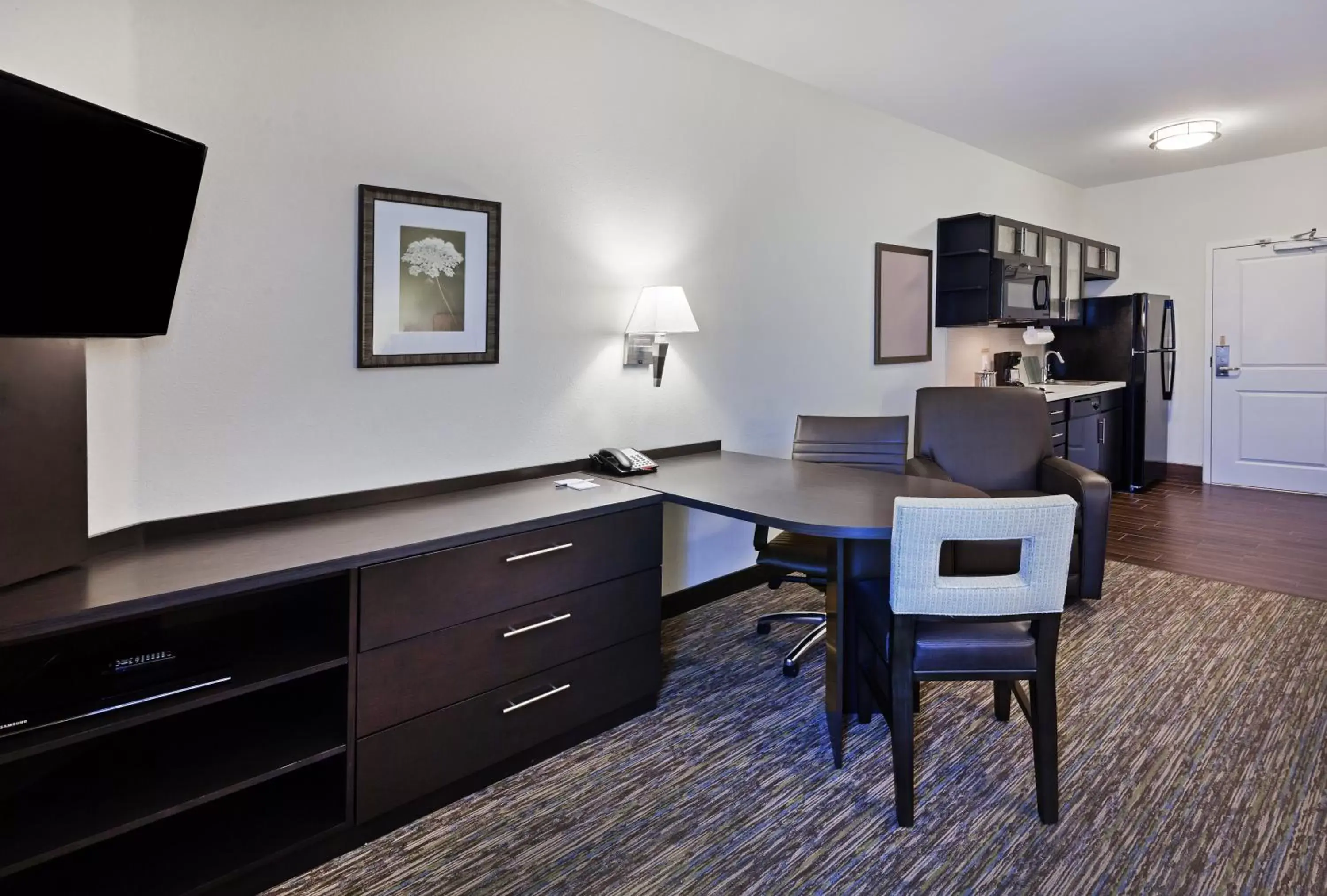 Photo of the whole room, TV/Entertainment Center in Candlewood Suites San Angelo, an IHG Hotel