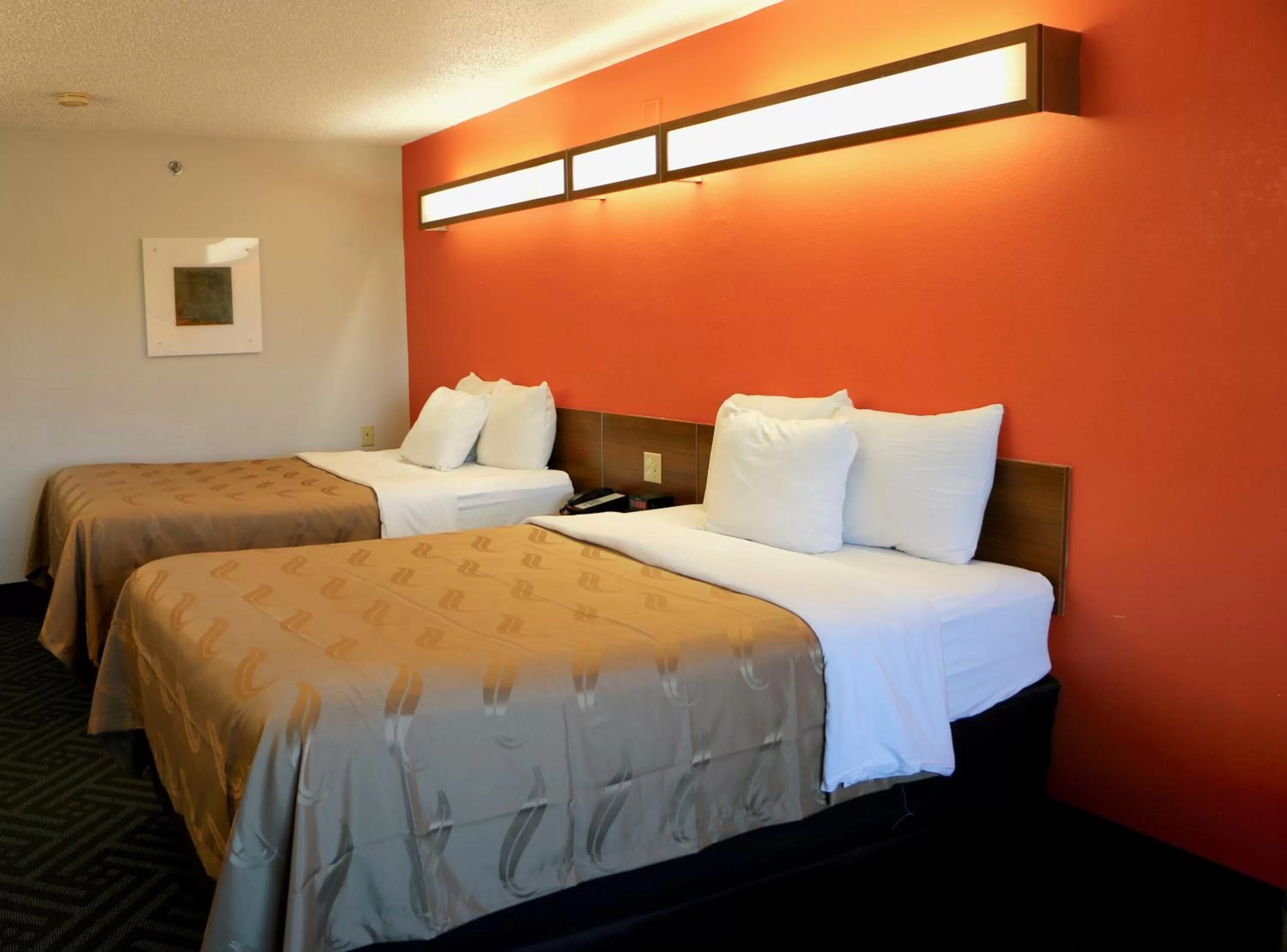 Bed in Quality Inn & Suites Watertown Fort Drum