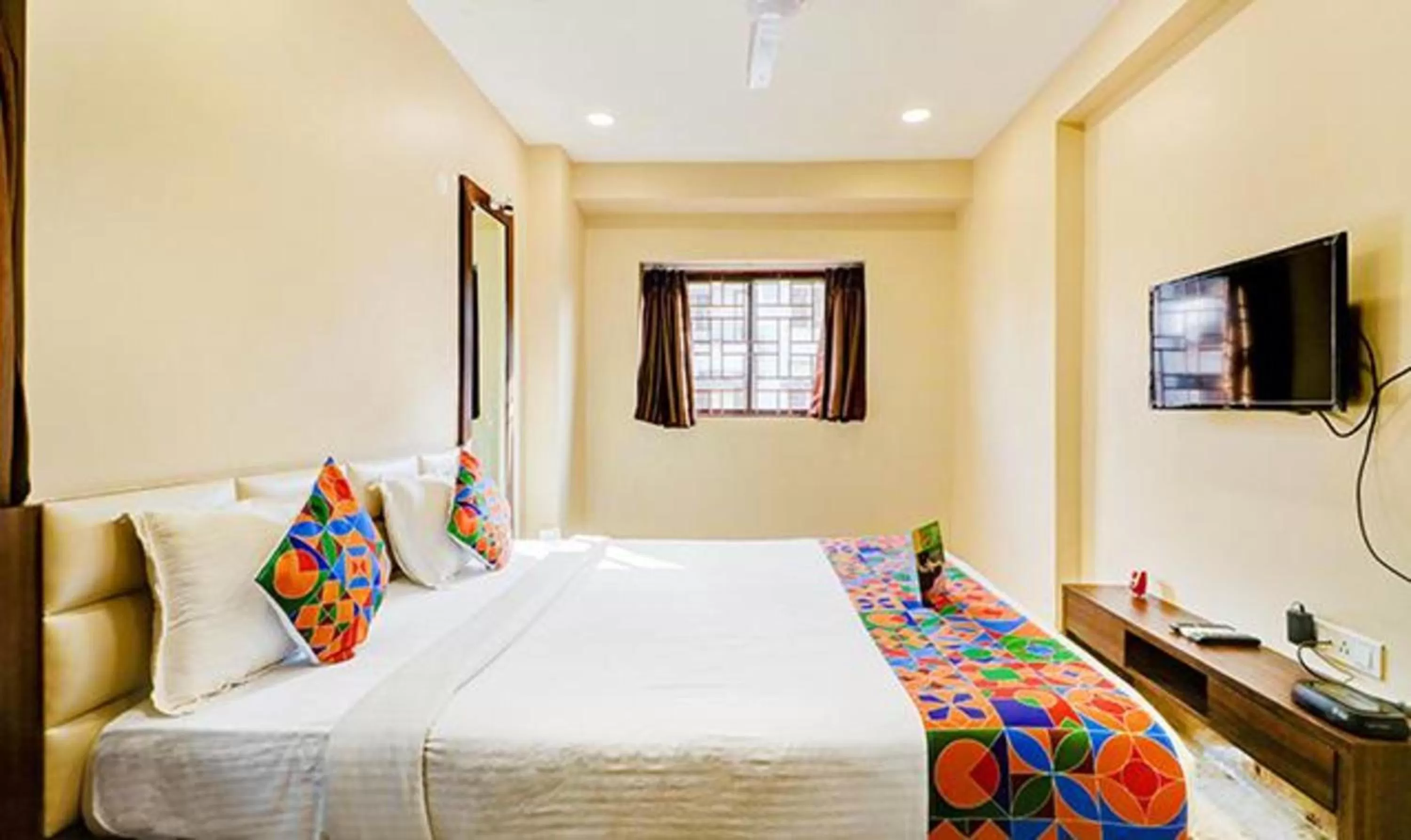 Bed in FabHotel Carnival