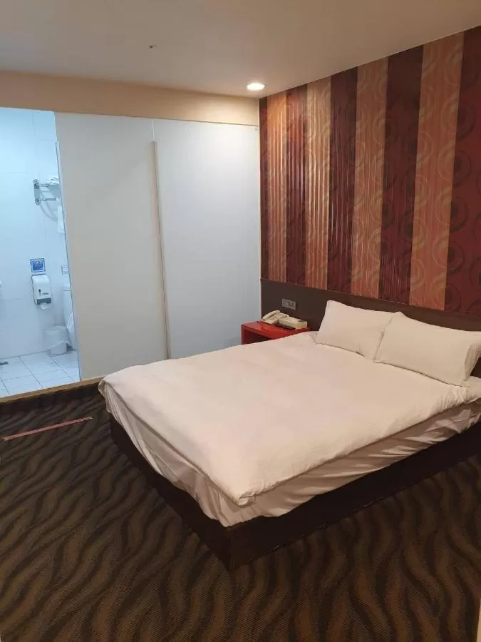 Bed in Funny Ximen Hotel