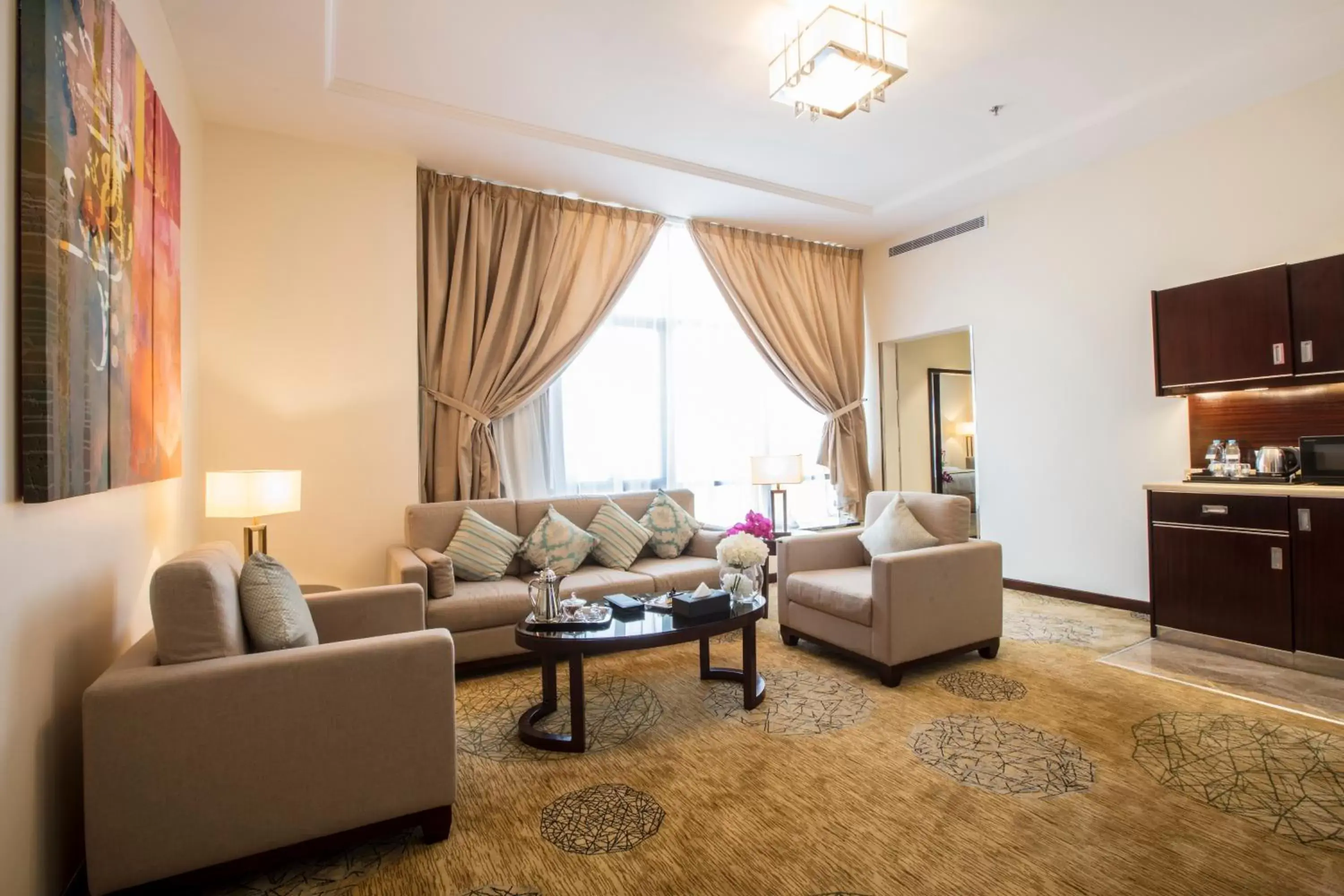 Kitchen or kitchenette, Seating Area in Prime Al Hamra Hotel