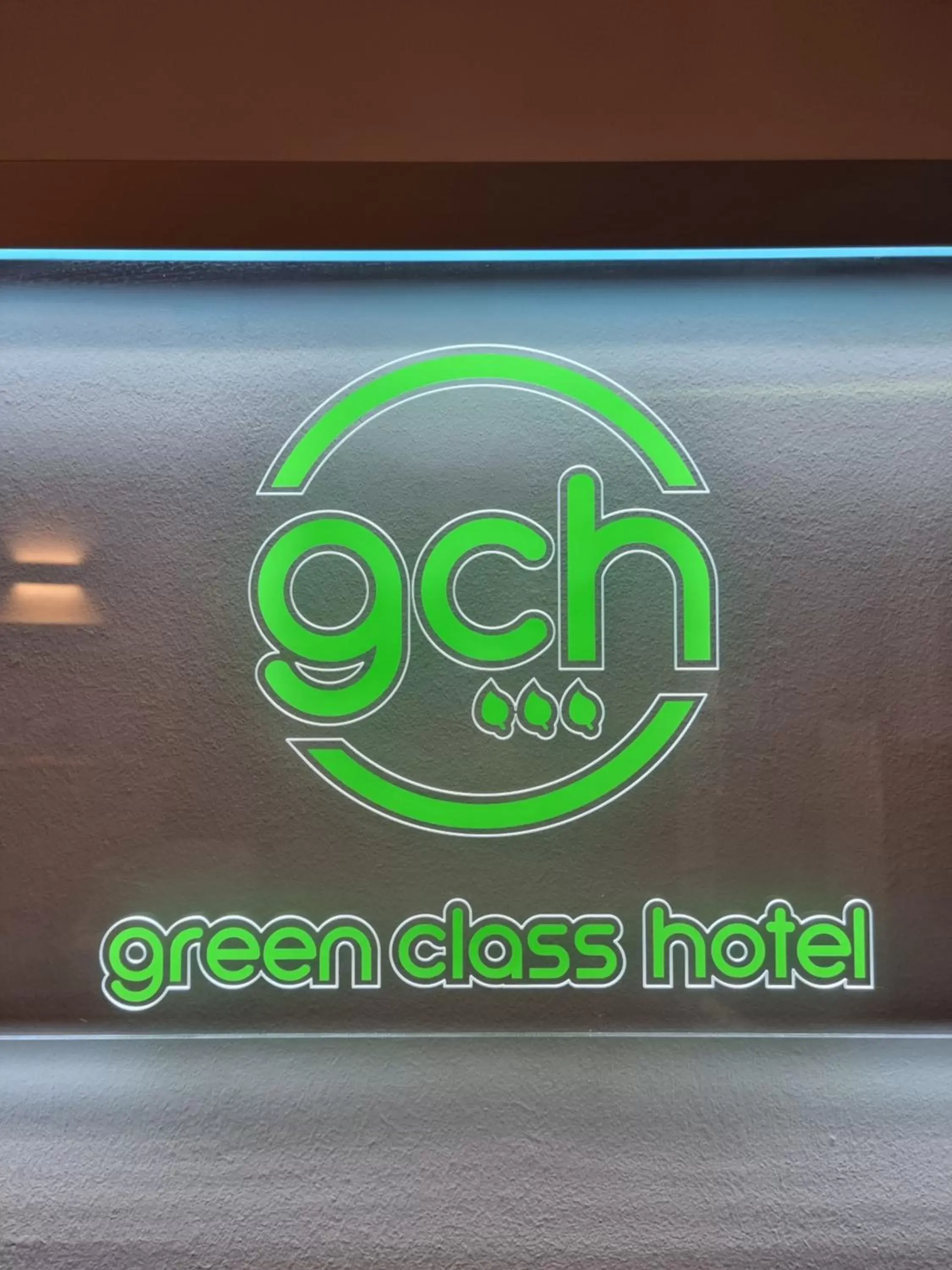Property logo or sign in Green Class Hotel Astoria