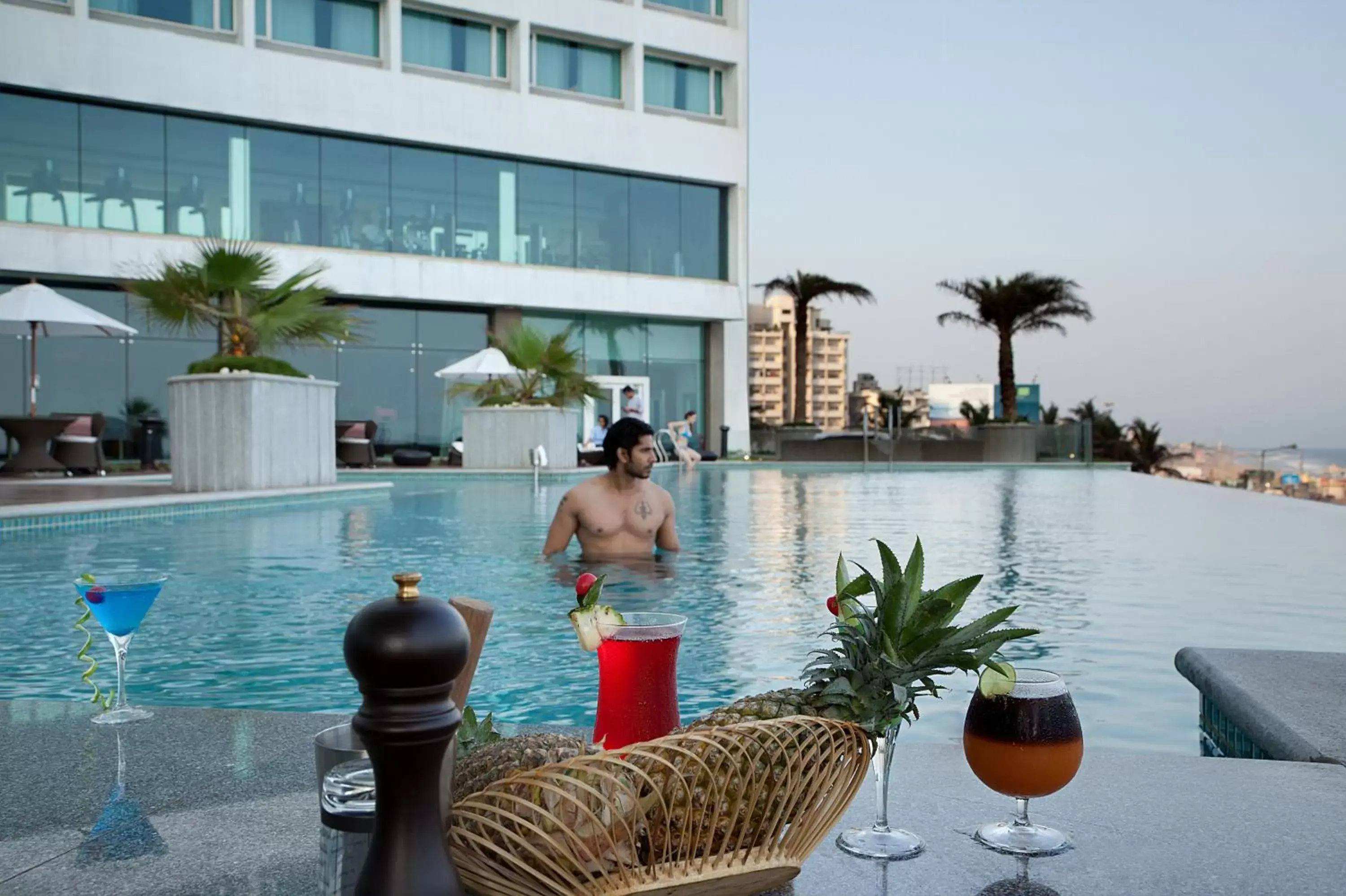 Balcony/Terrace, Swimming Pool in Novotel Visakhapatnam Varun Beach