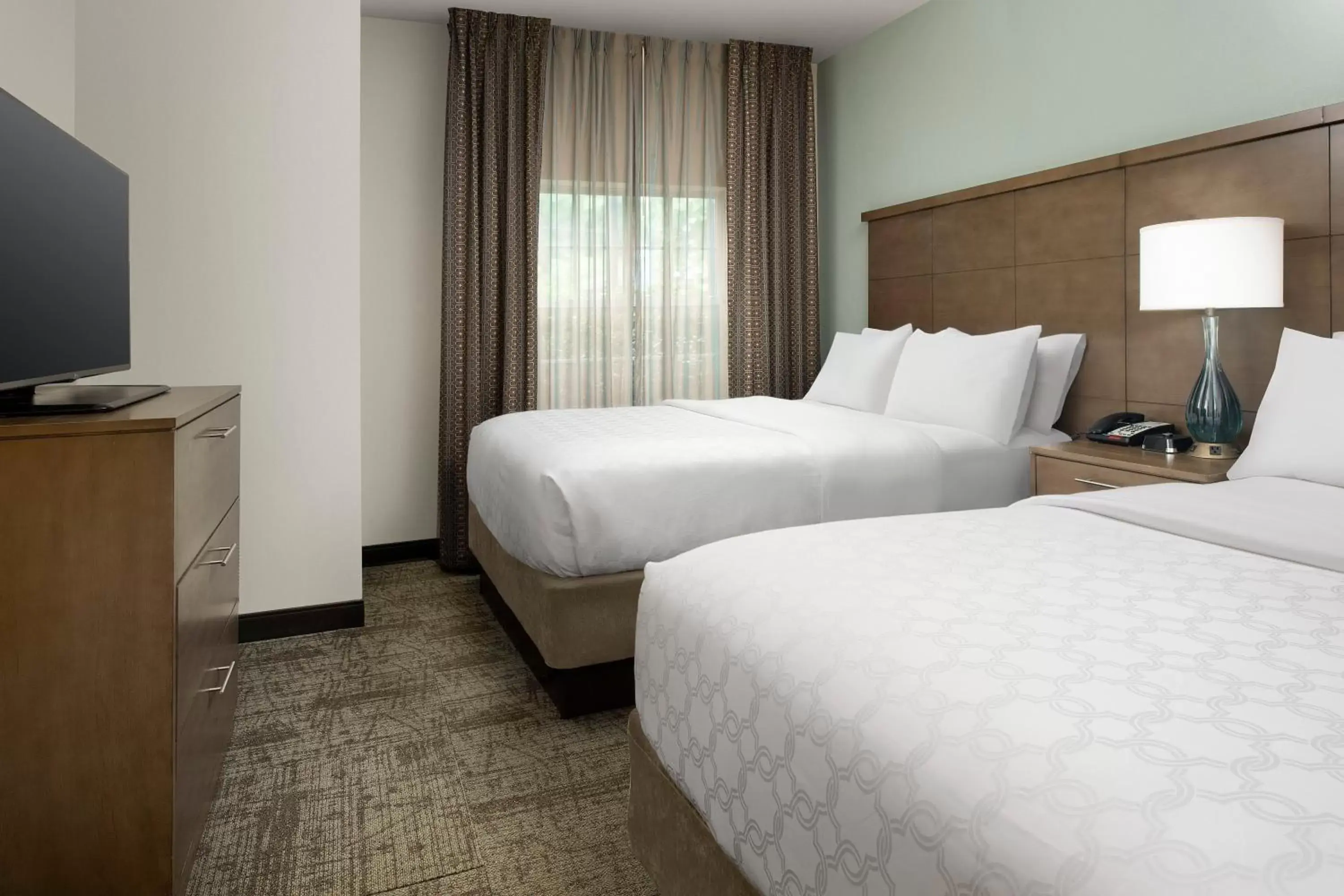 Photo of the whole room, Bed in Staybridge Suites Greenville I-85 Woodruff Road, an IHG Hotel