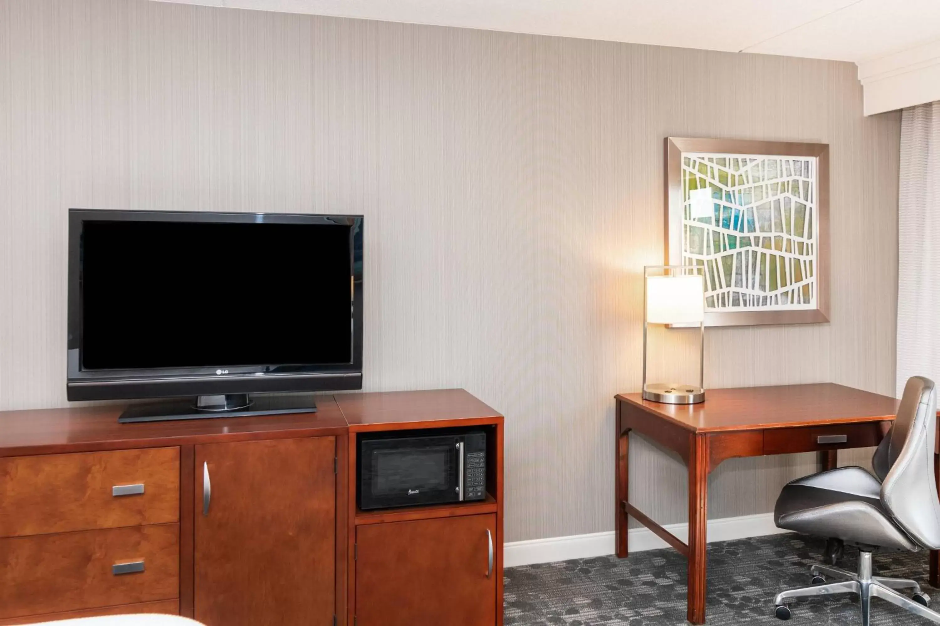 Photo of the whole room, TV/Entertainment Center in Courtyard by Marriott Bloomington