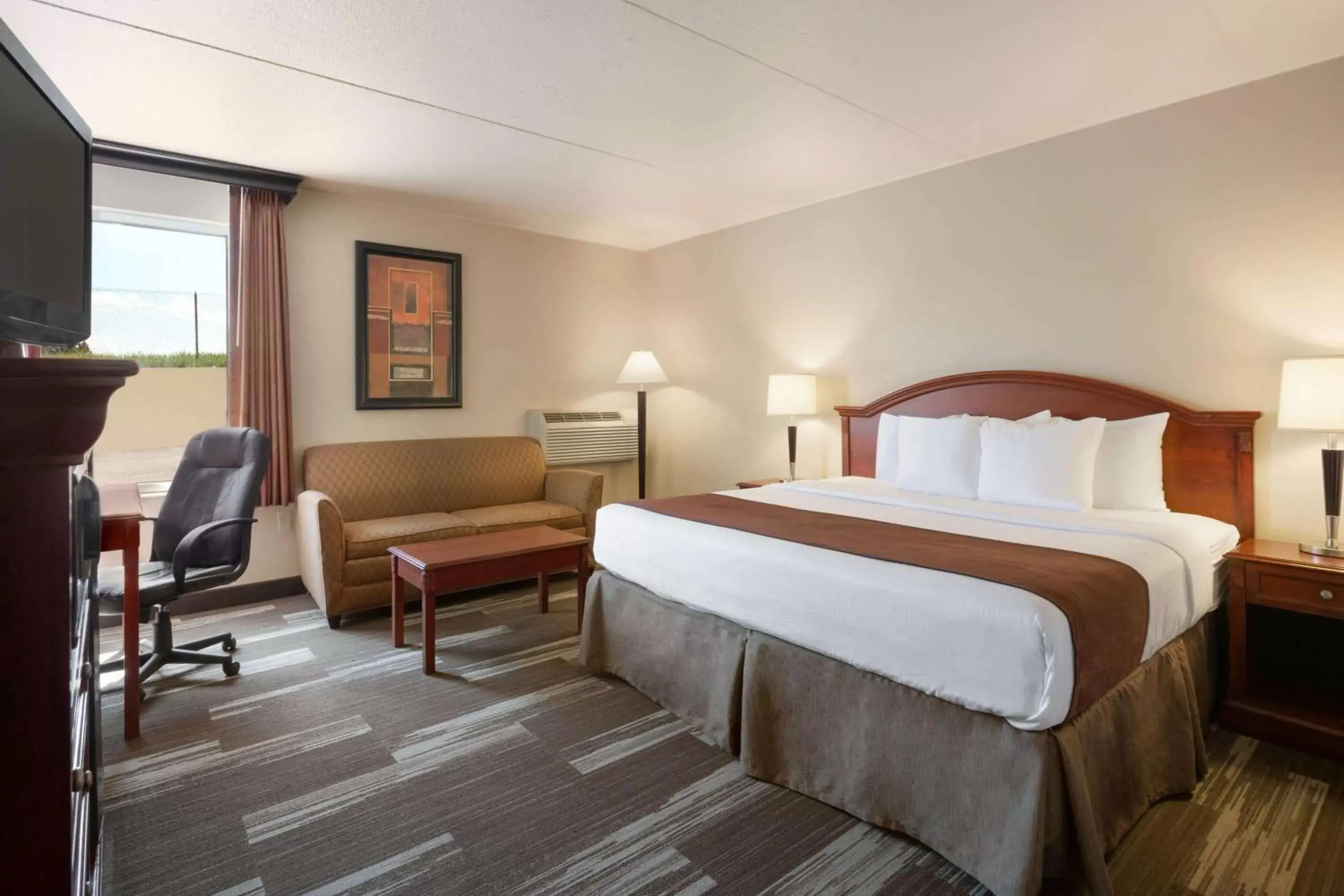 Photo of the whole room, Bed in Baymont by Wyndham Mandan Bismarck Area Photo of the whole room, Bed in Baymont by Wyndham Mandan Bismarck Area