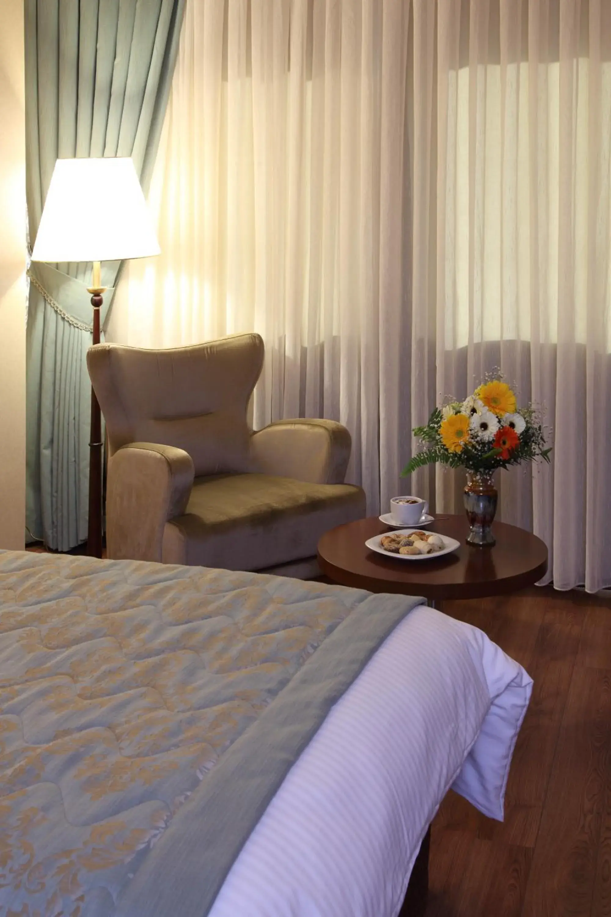 Bed, Seating Area in Hotel Senbayrak City
