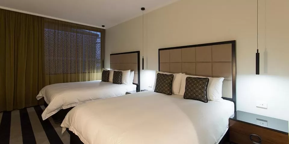 Bed in Ellen Hotel