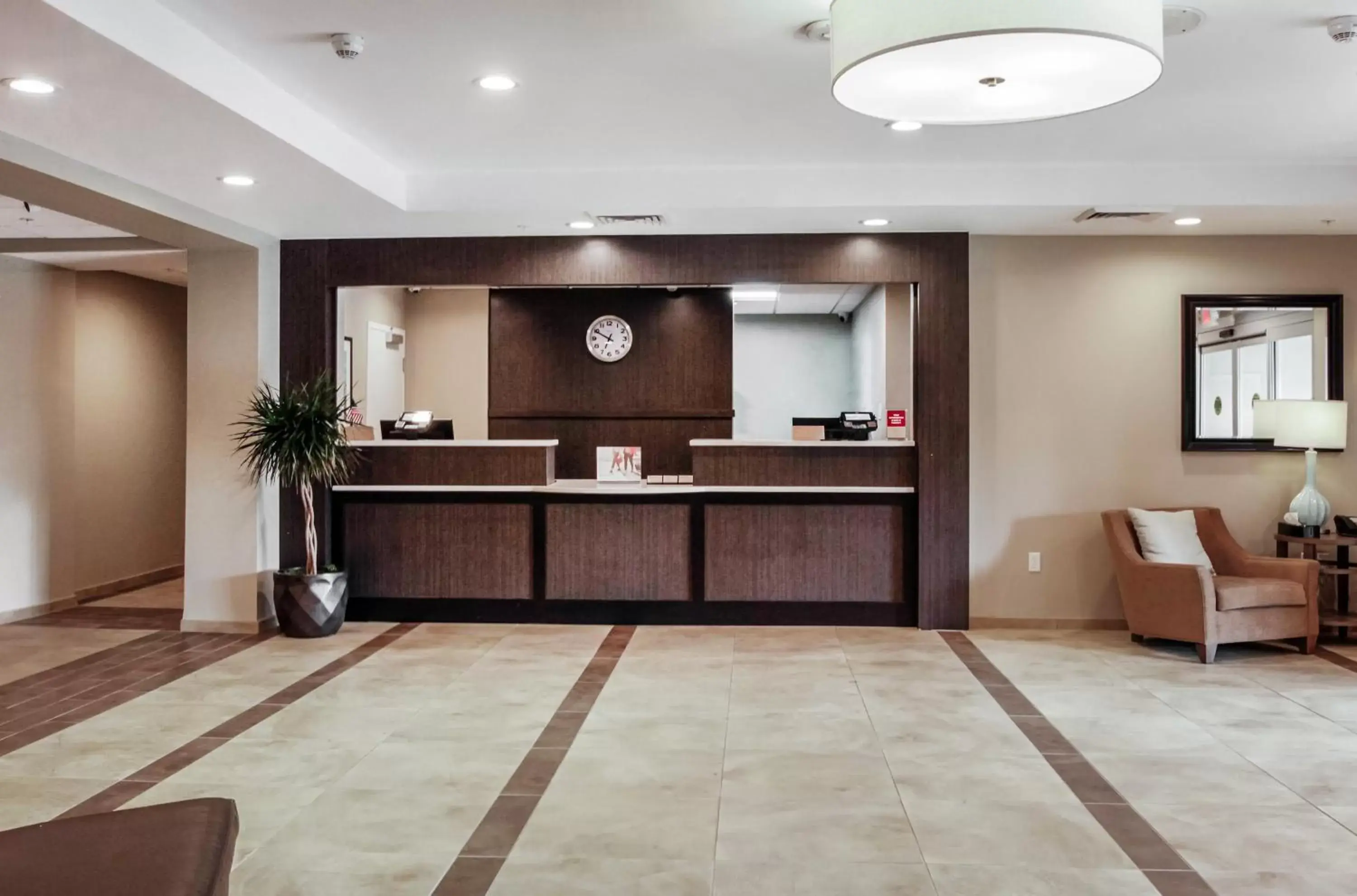 Property building, Lobby/Reception in Candlewood Suites - Brighton, an IHG Hotel