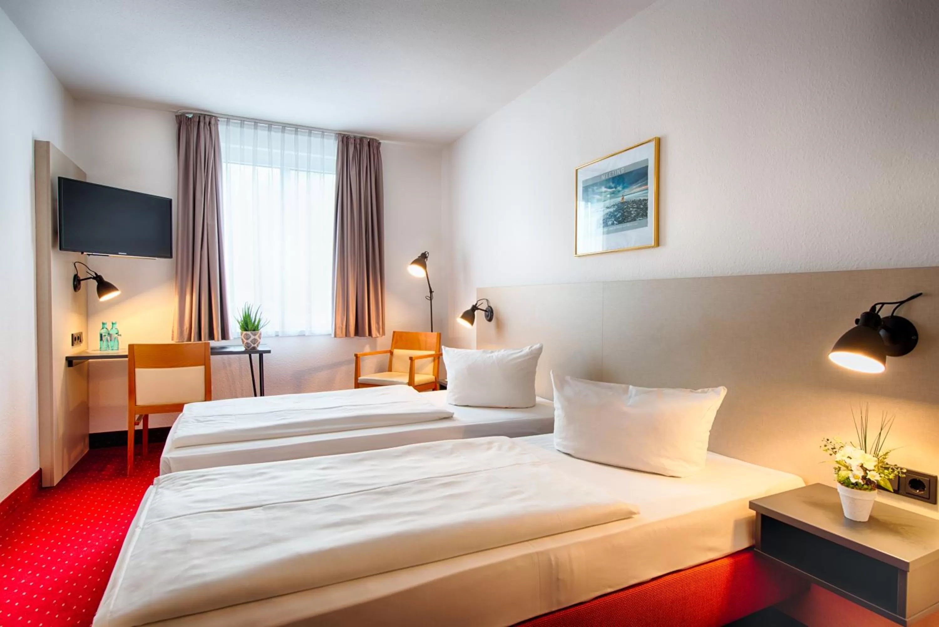 Photo of the whole room, Bed in ACHAT Hotel Chemnitz