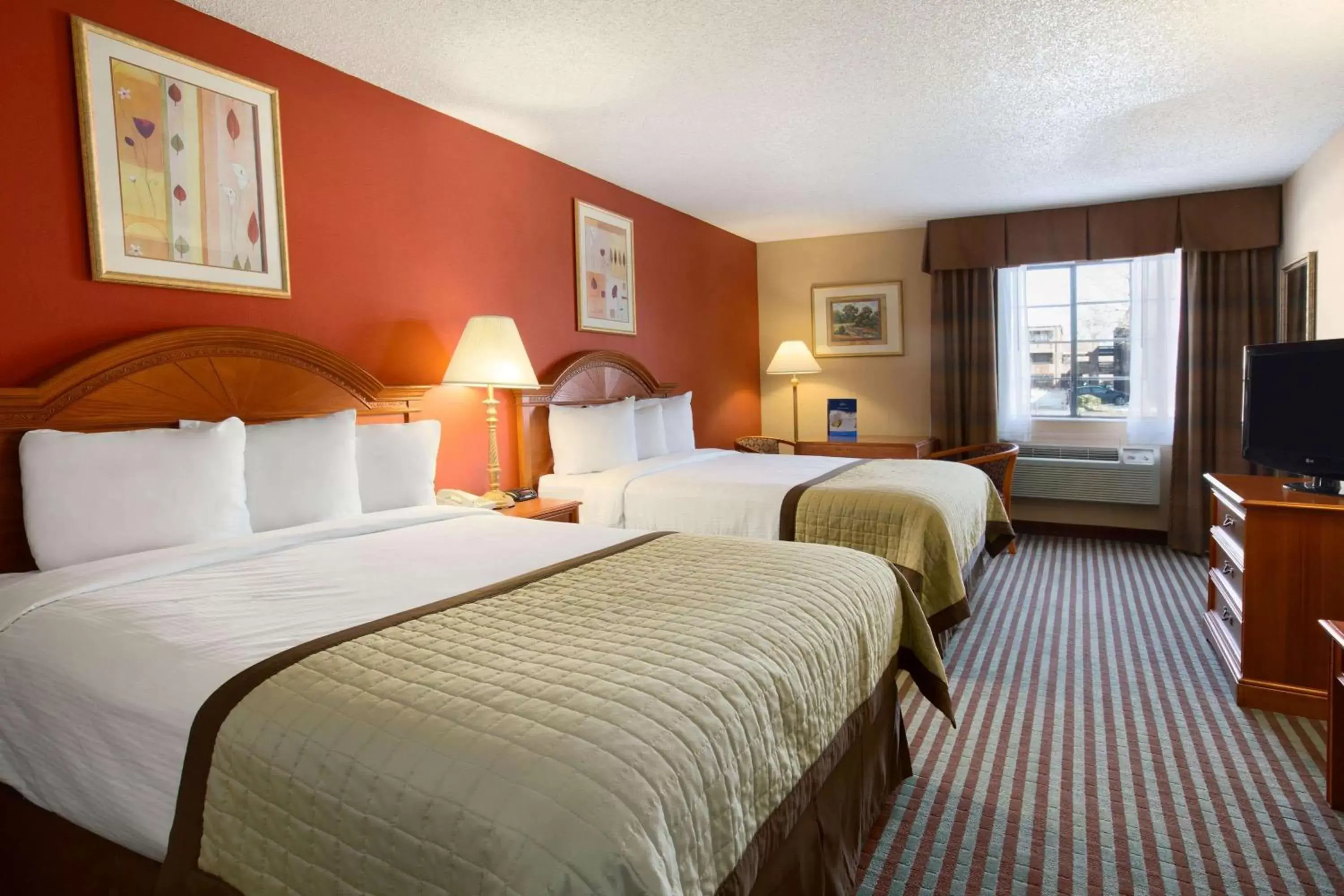 Photo of the whole room, Bed in Baymont by Wyndham Oklahoma City Airport