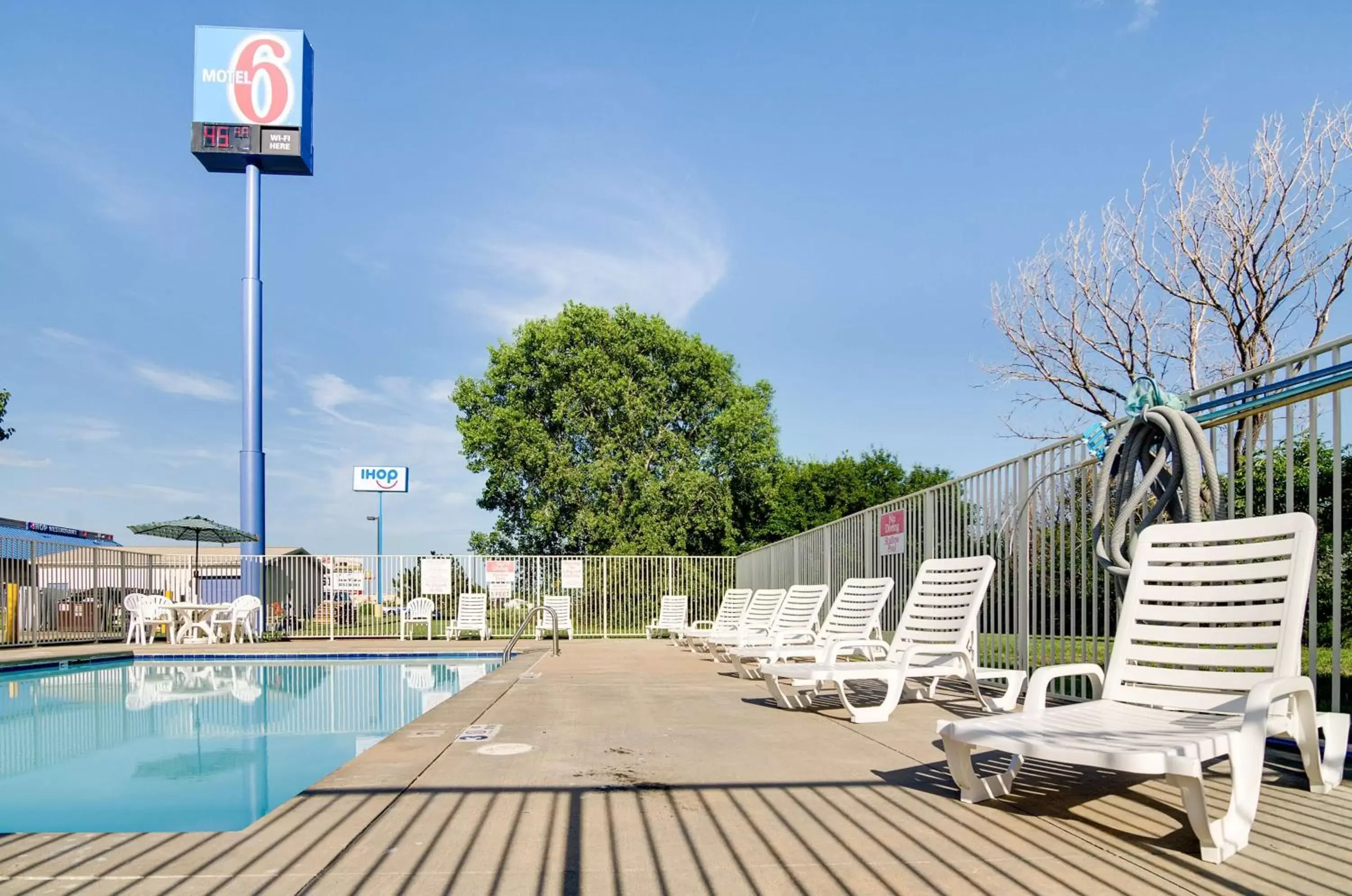 Property logo or sign, Swimming Pool in Motel 6-Salina, KS