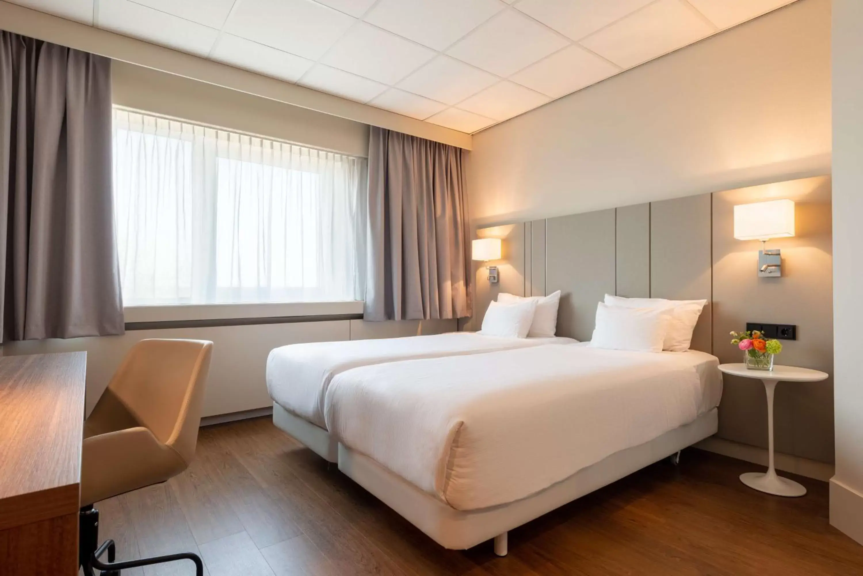 Photo of the whole room, Bed in NH Noordwijk Conference Centre Leeuwenhorst