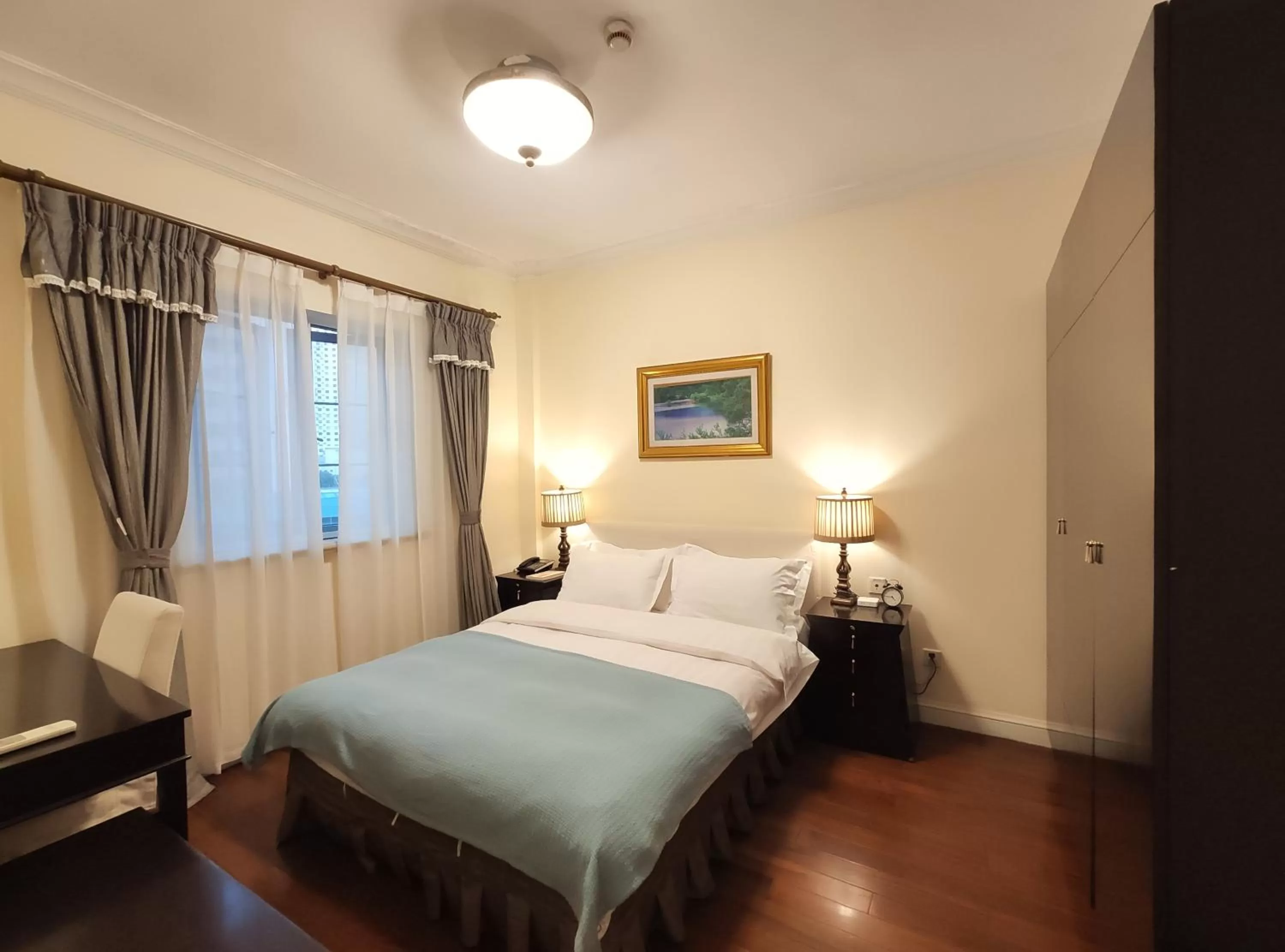 Bed in Ladoll Service Apartments