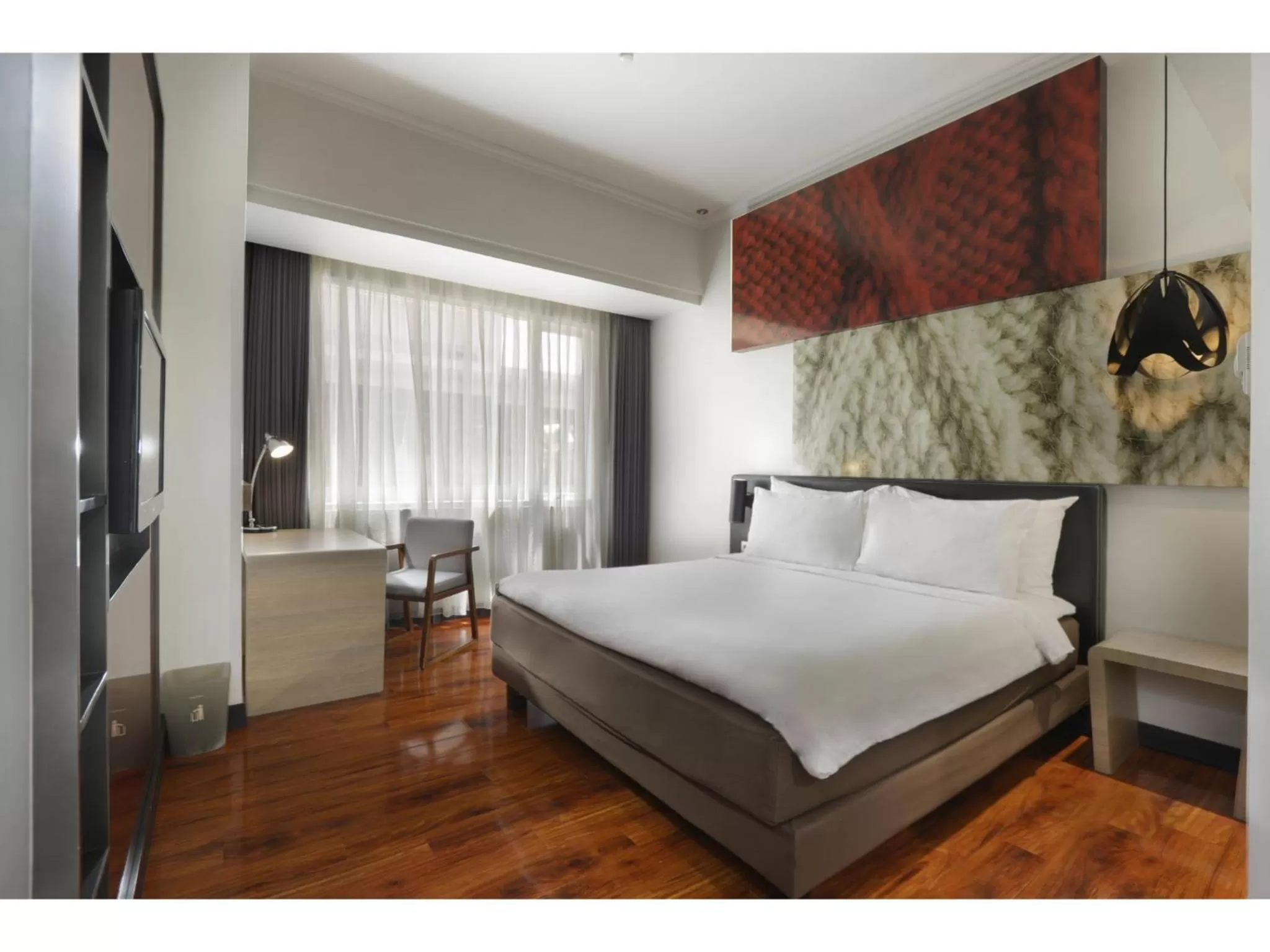 Bed in Malyabhara Hotel