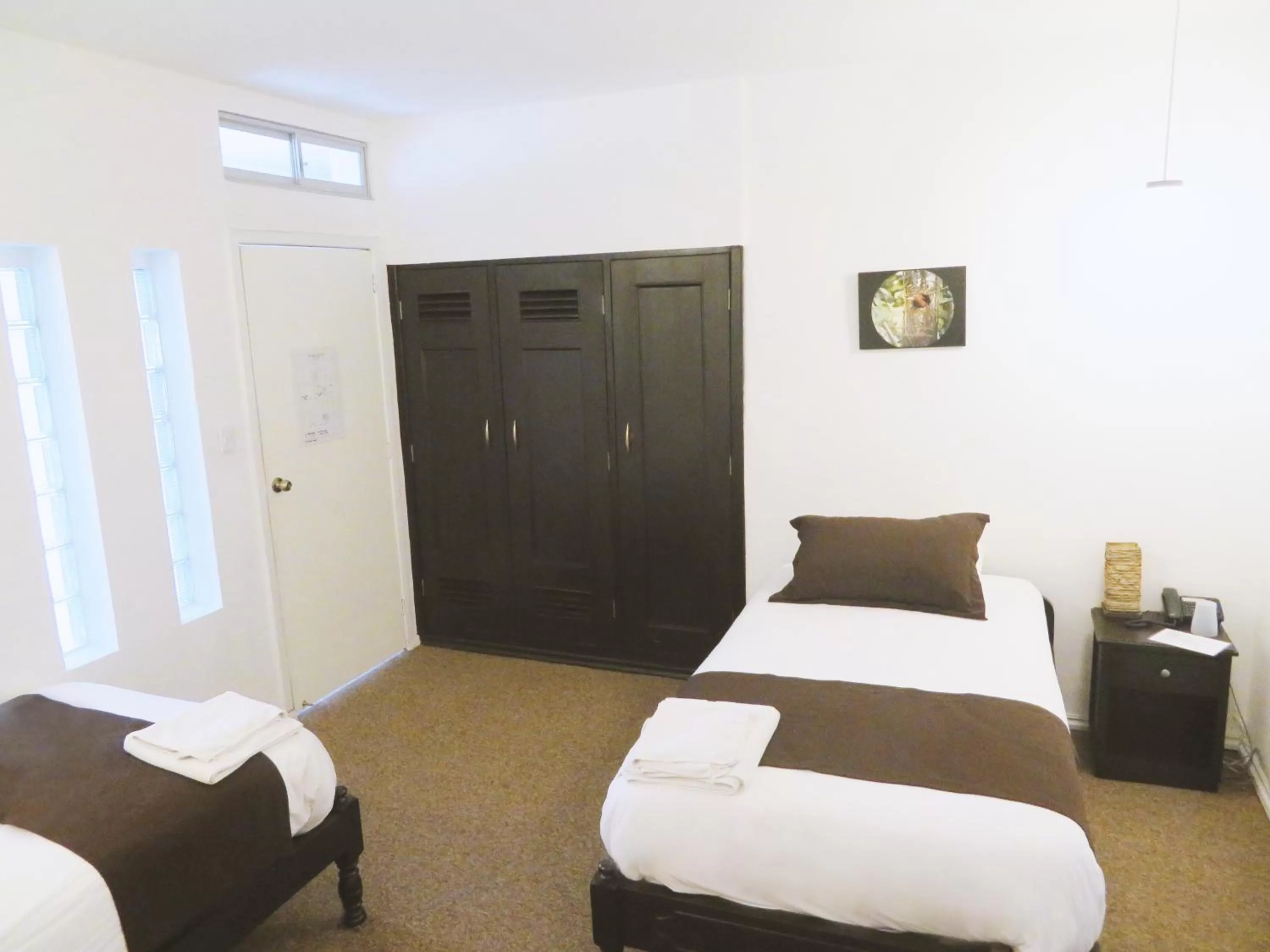 Bed in Bird Garden Guest House