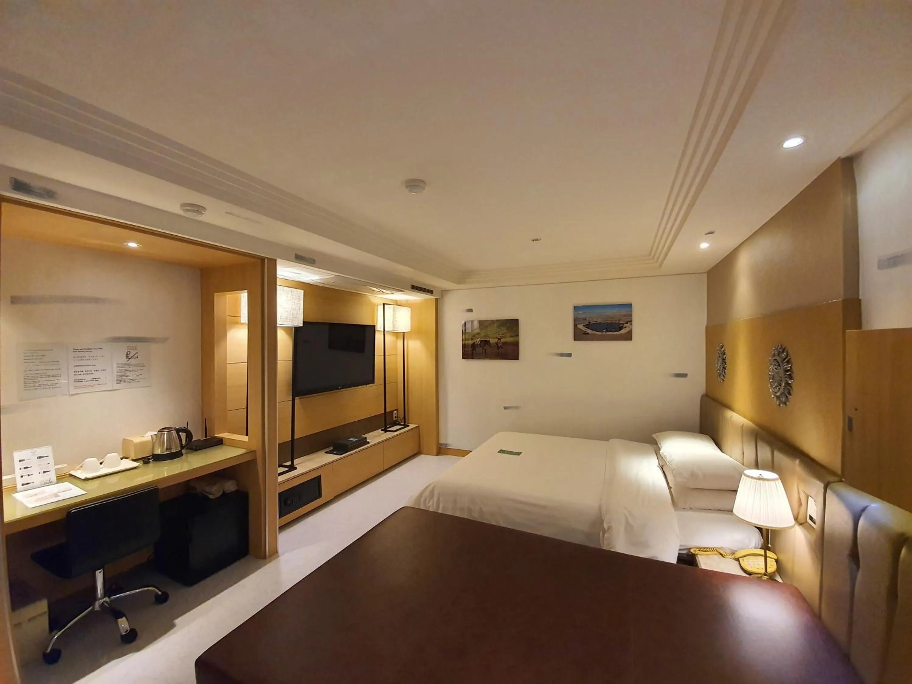 Bed in Friendly DH Naissance Hotel by Mindrum Group