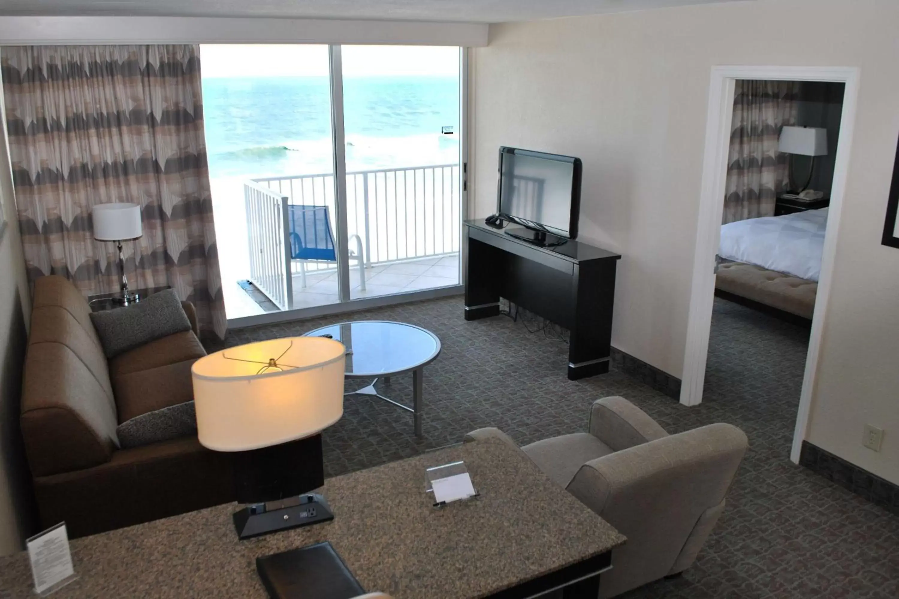 Bedroom, Seating Area in Radisson Suite Hotel Oceanfront