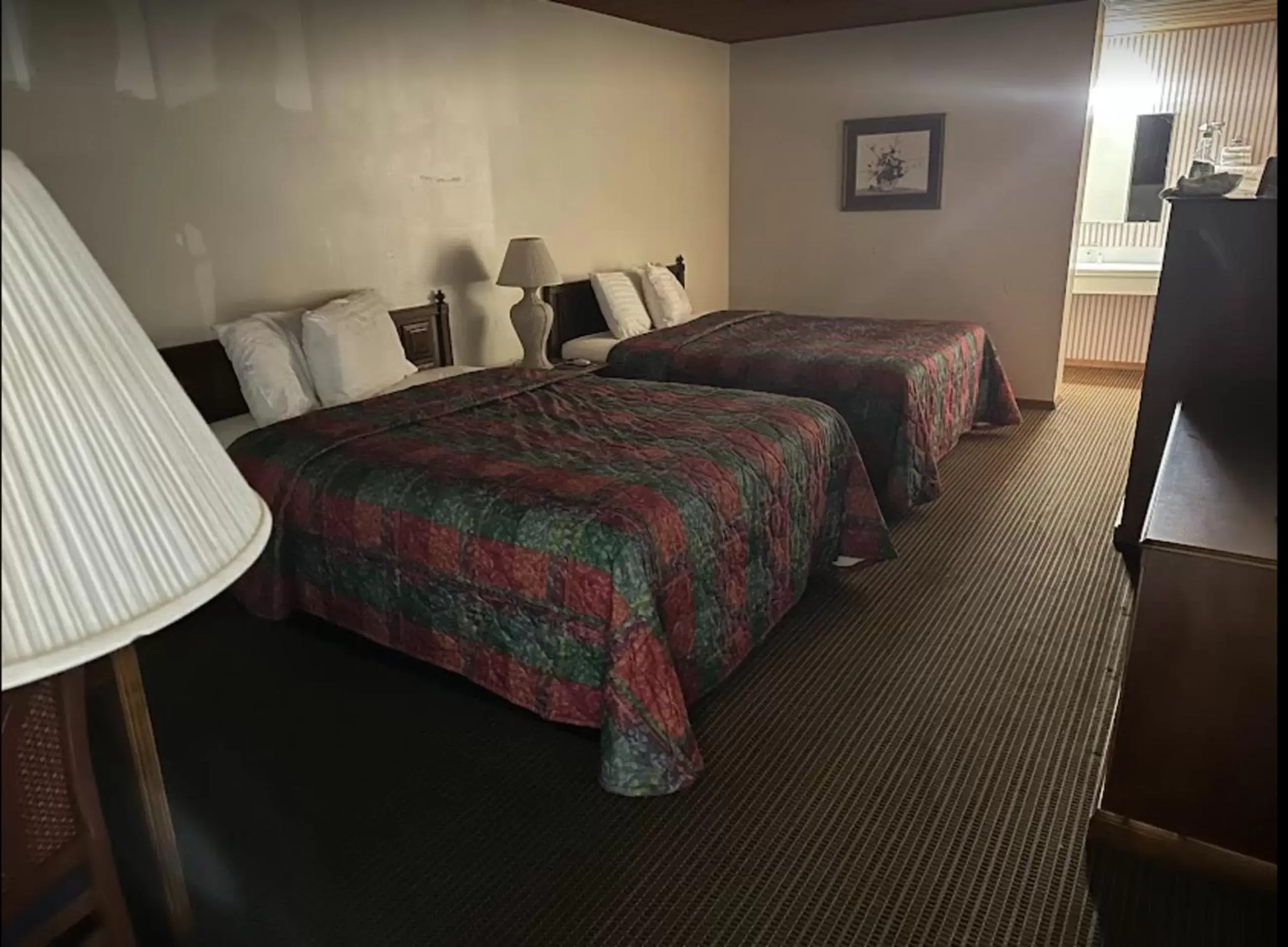 Bedroom, Bed in Love Hotels Western Holiday by OYO at Harlan Lake NE