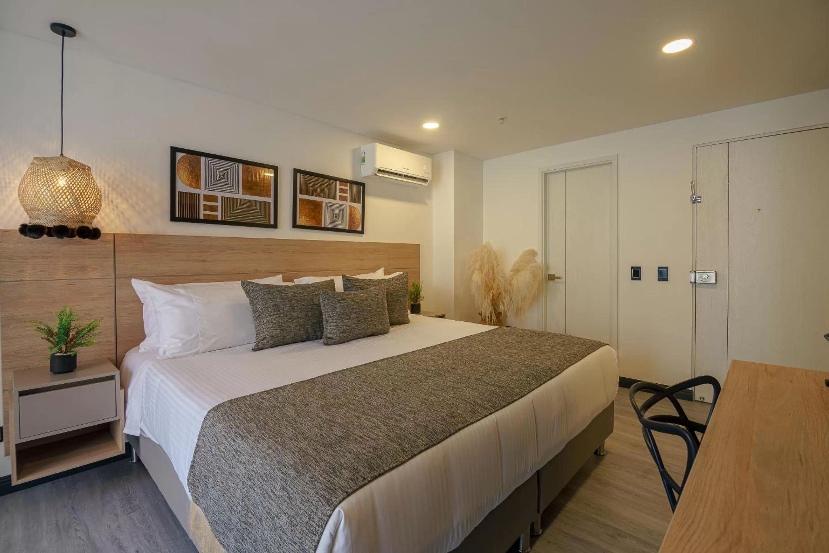 Photo of the whole room, Bed in First Class Hotel