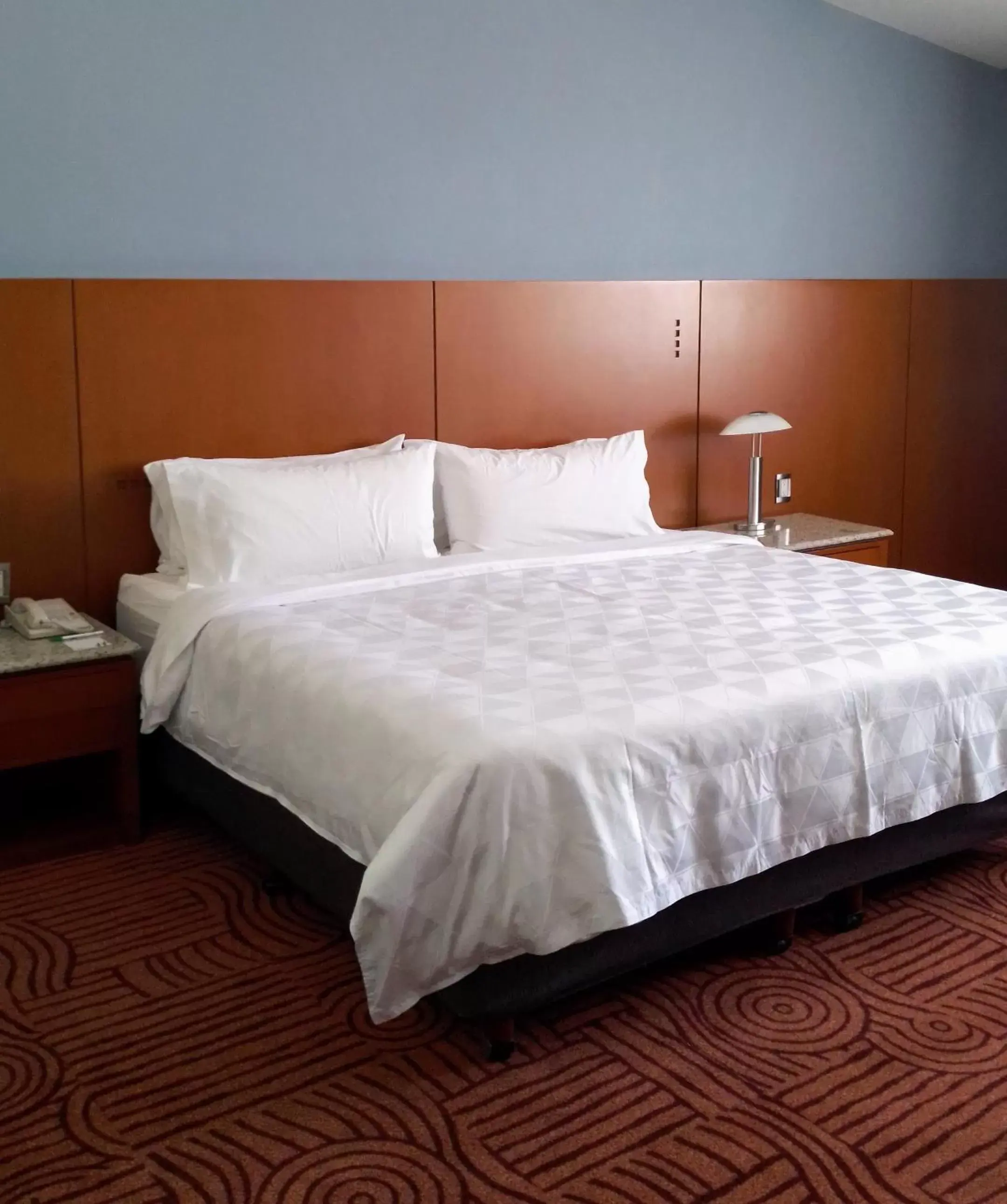 Bed in Holiday Inn Puebla Finsa, an IHG Hotel