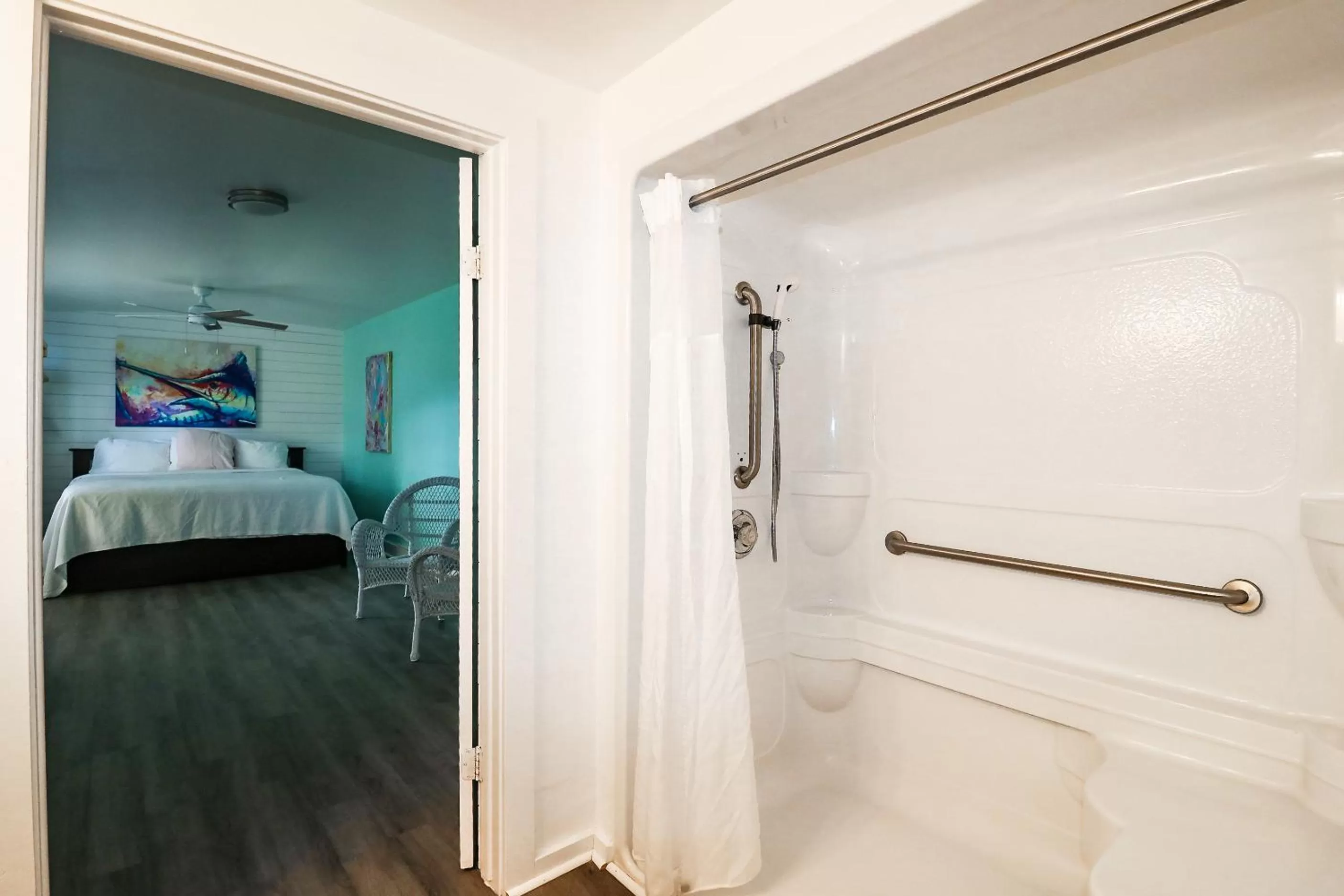 Bathroom, Bed in Drop Anchor Resort & Marina