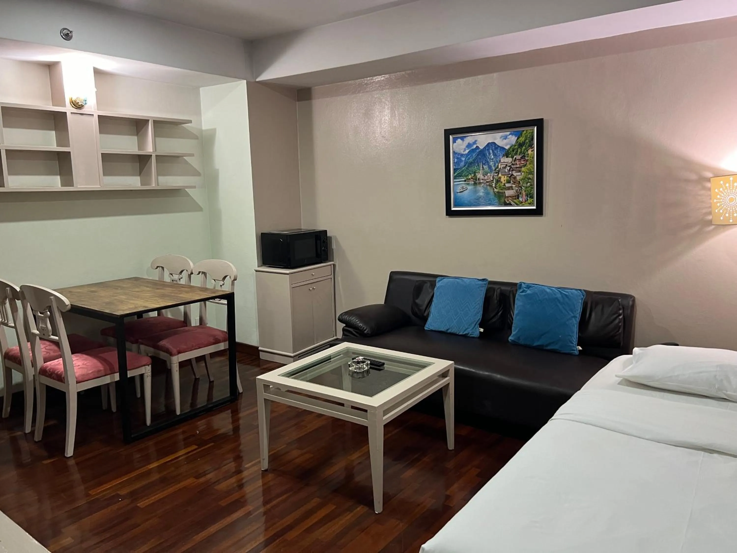 Bed in Mall Suites Hotel