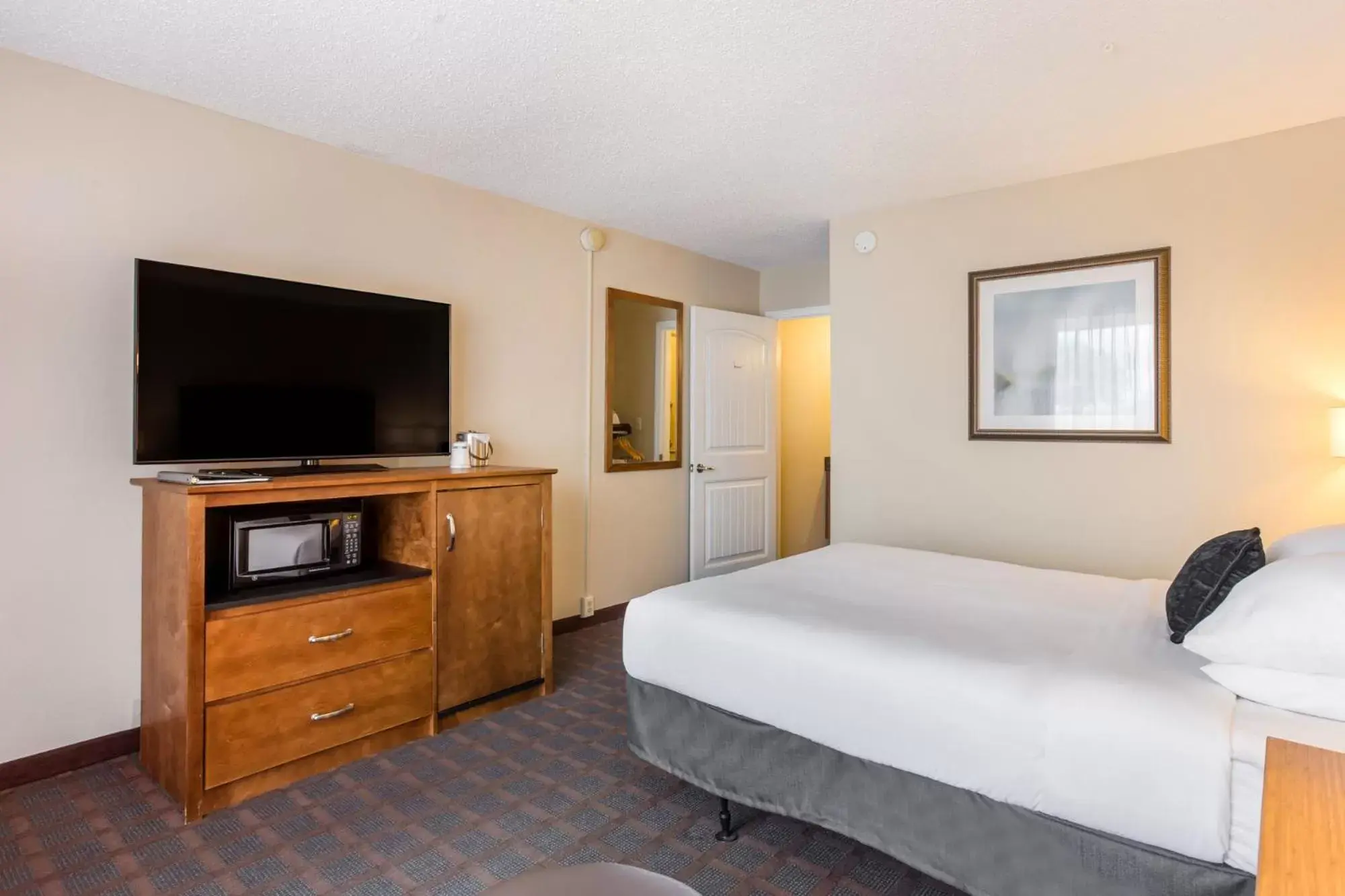 Bed in Red Lion Inn & Suites Branson