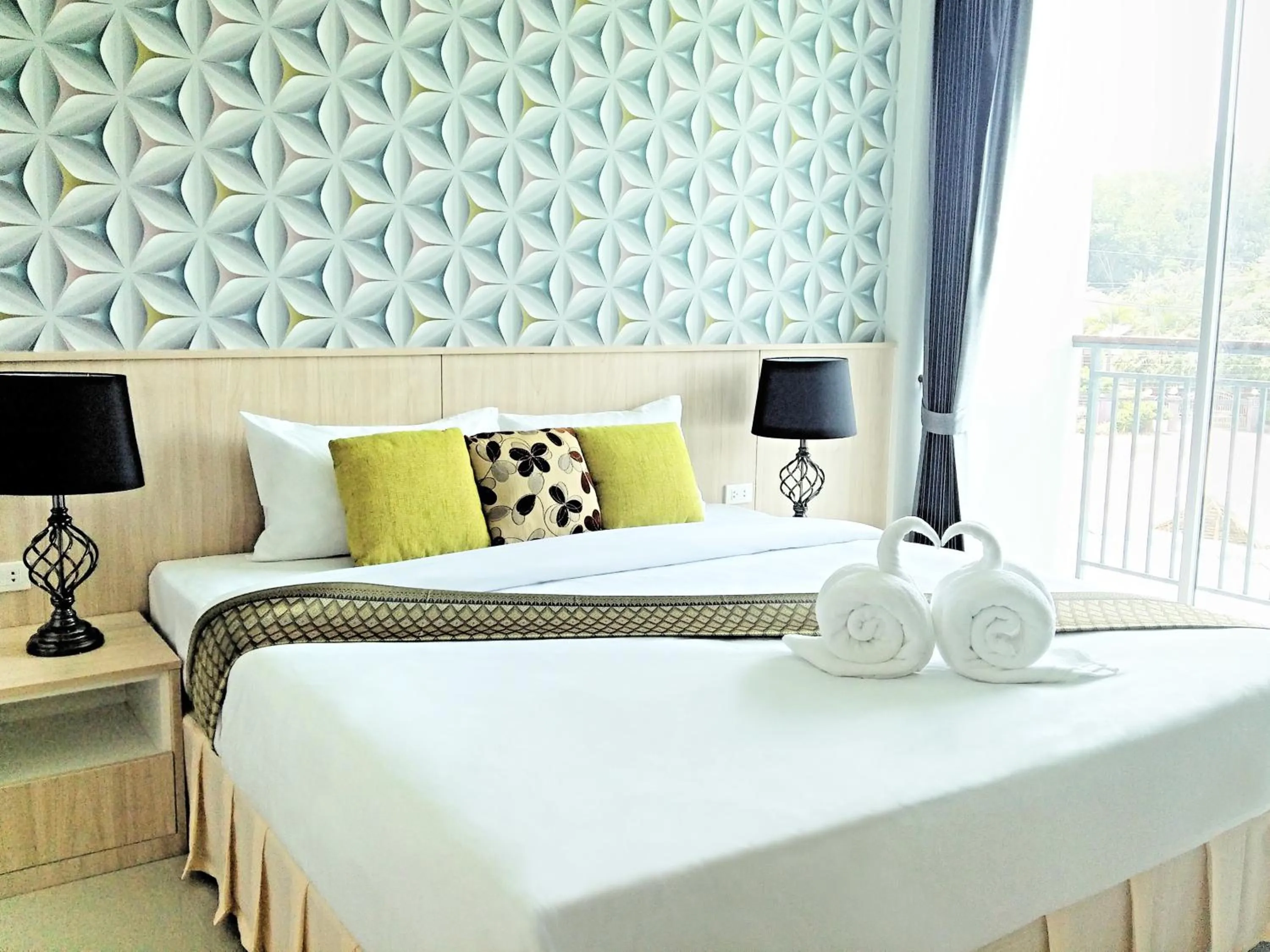 Bed in The Wings Boutique Hotels Krabi Ko Lanta