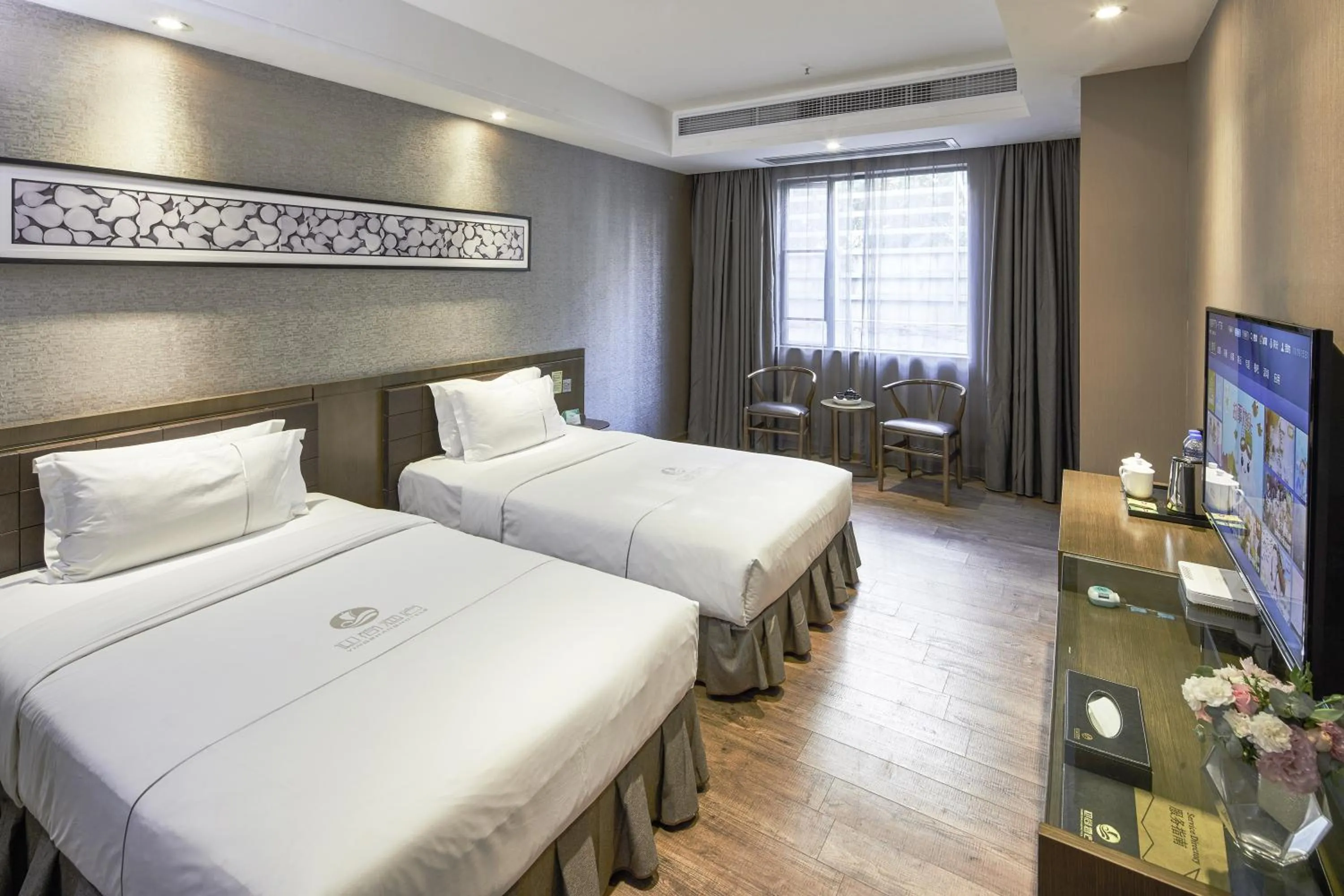 Bed in INSAIL Hotel (Shenzhen Dongmen Branch)