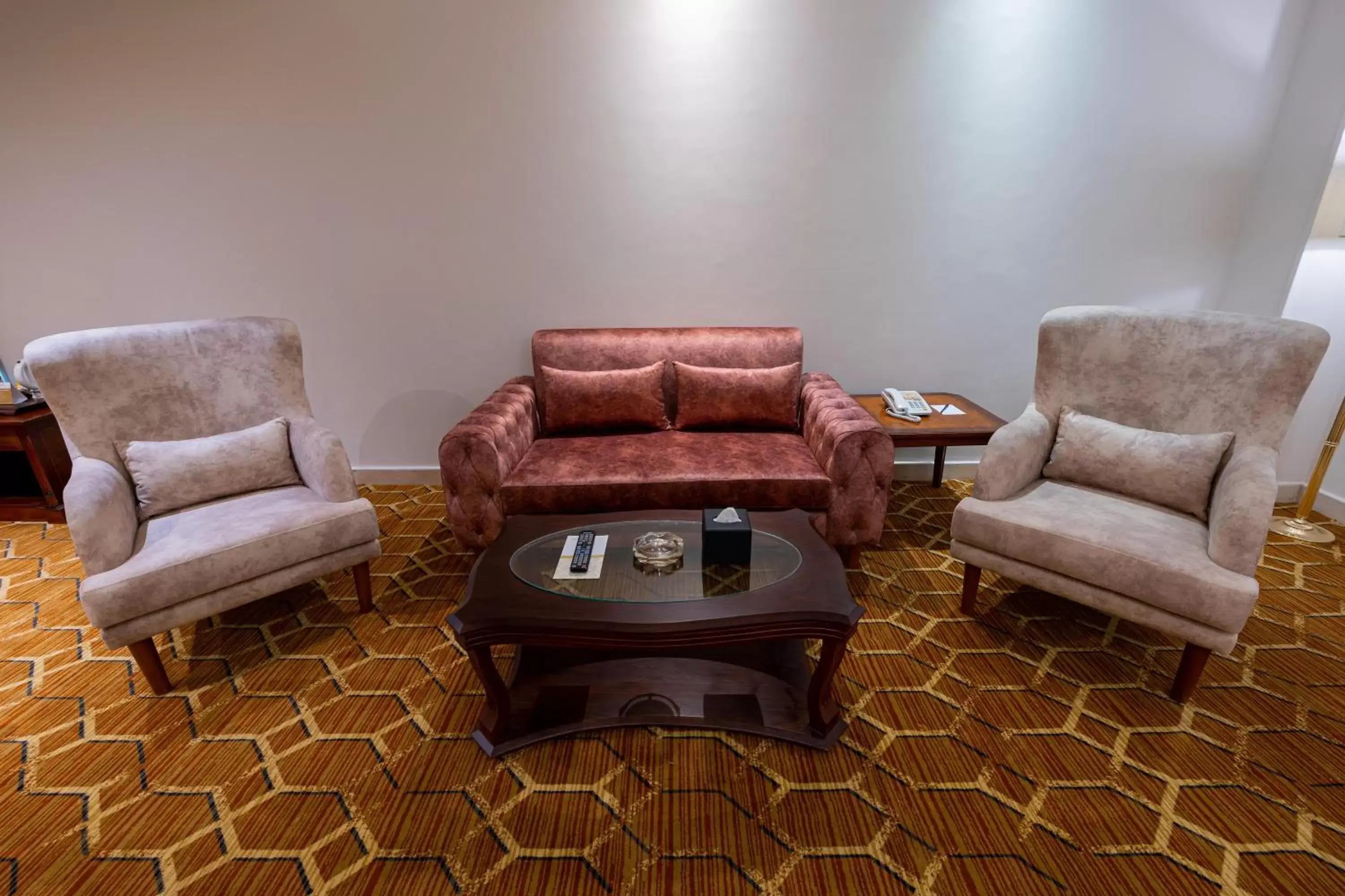 Photo of the whole room, Seating Area in Triumph Plaza Hotel