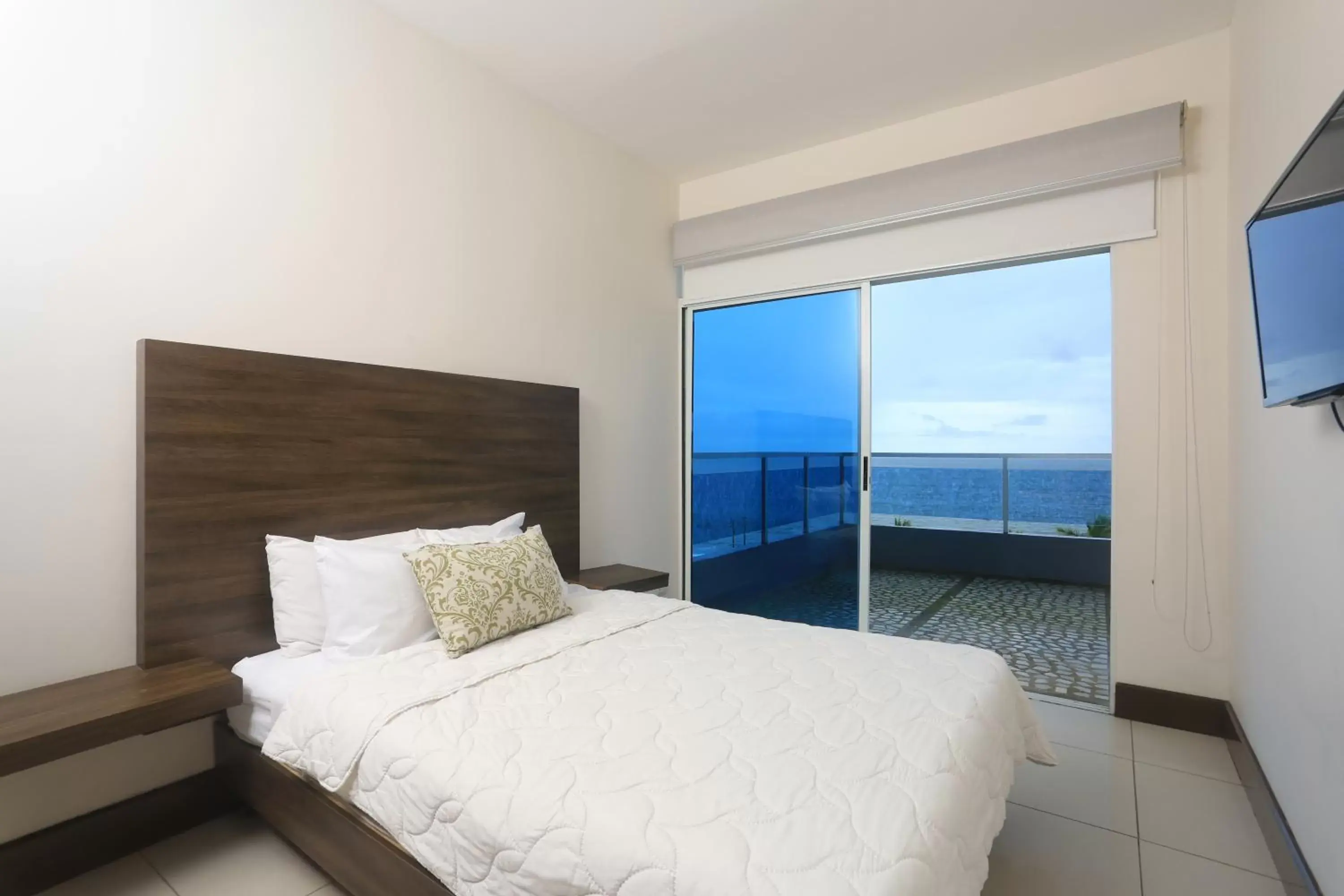 Bed in Puerto Azul Resort & Club Nautico