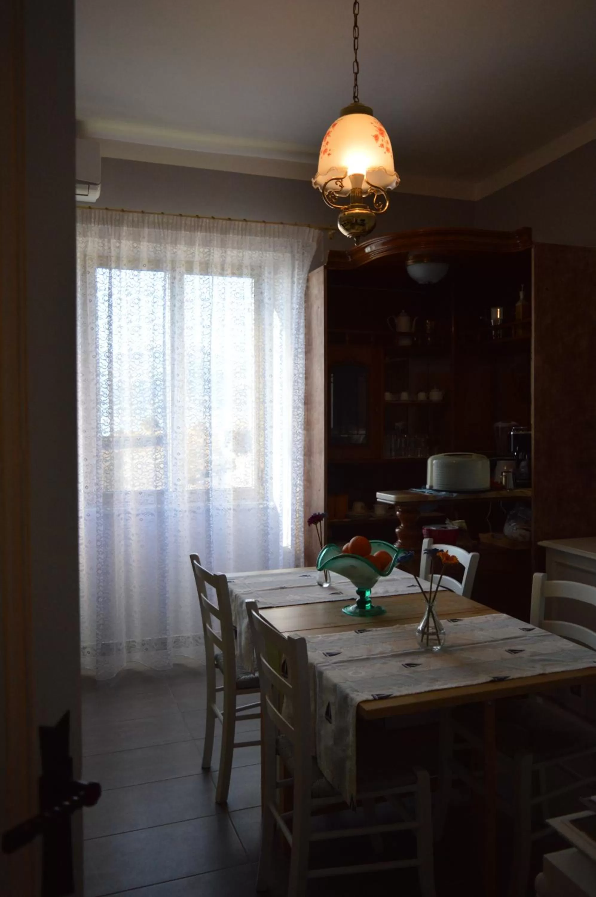 Communal lounge/ TV room in B&B Al Golfo