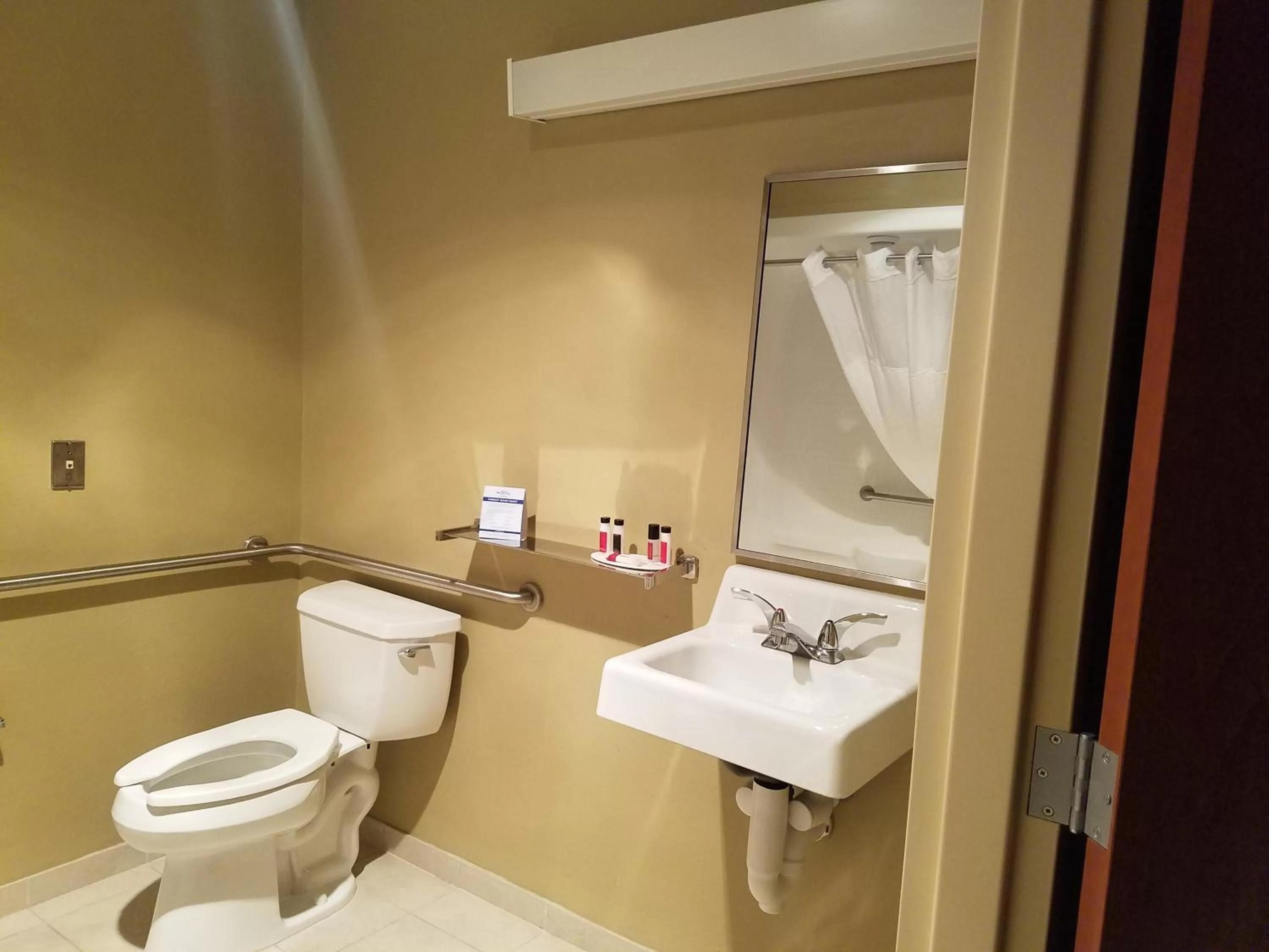 Toilet in Microtel Inn & Suites by Wyndham Dover New Hampshire