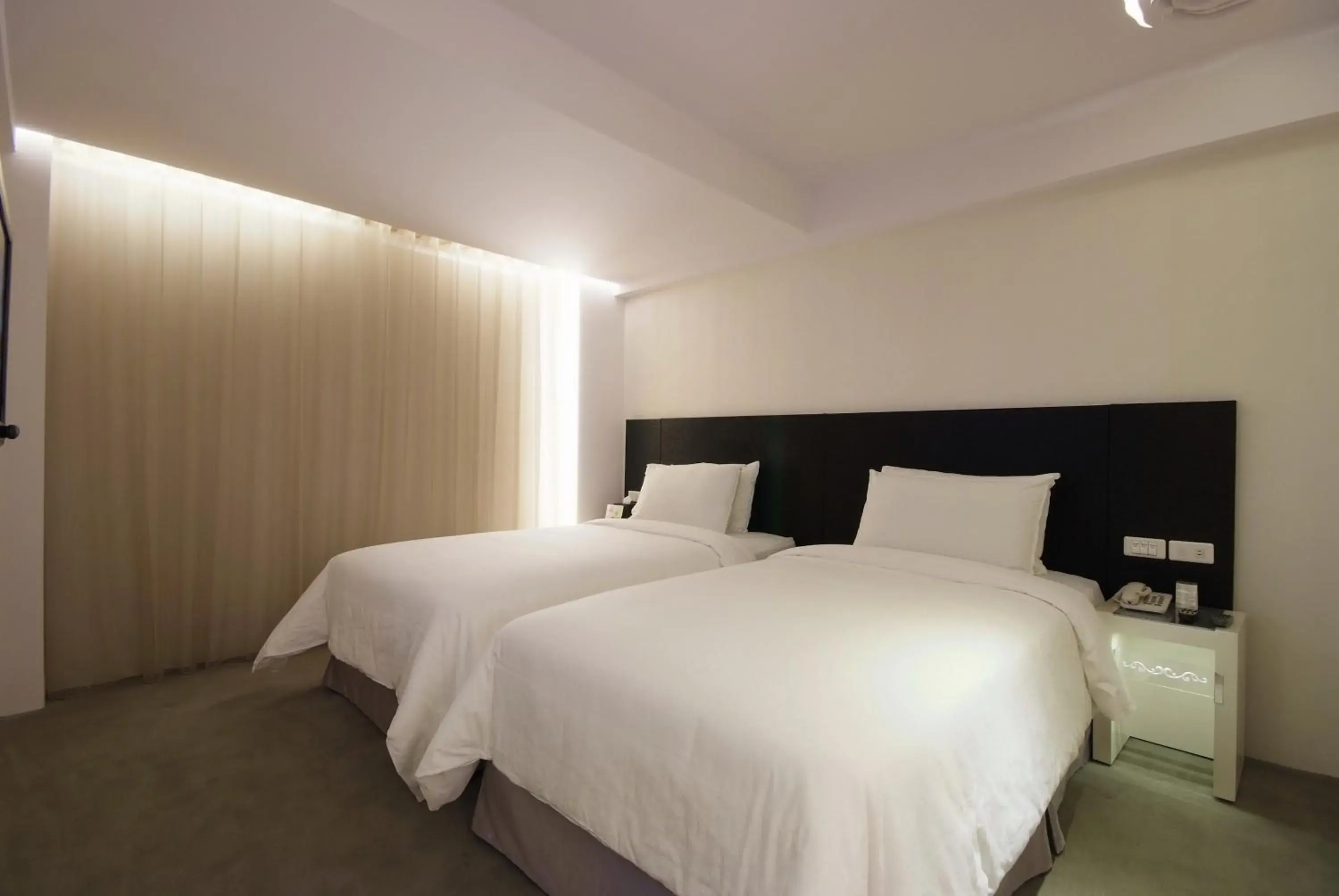 Bed in Forward Hotel Nangang