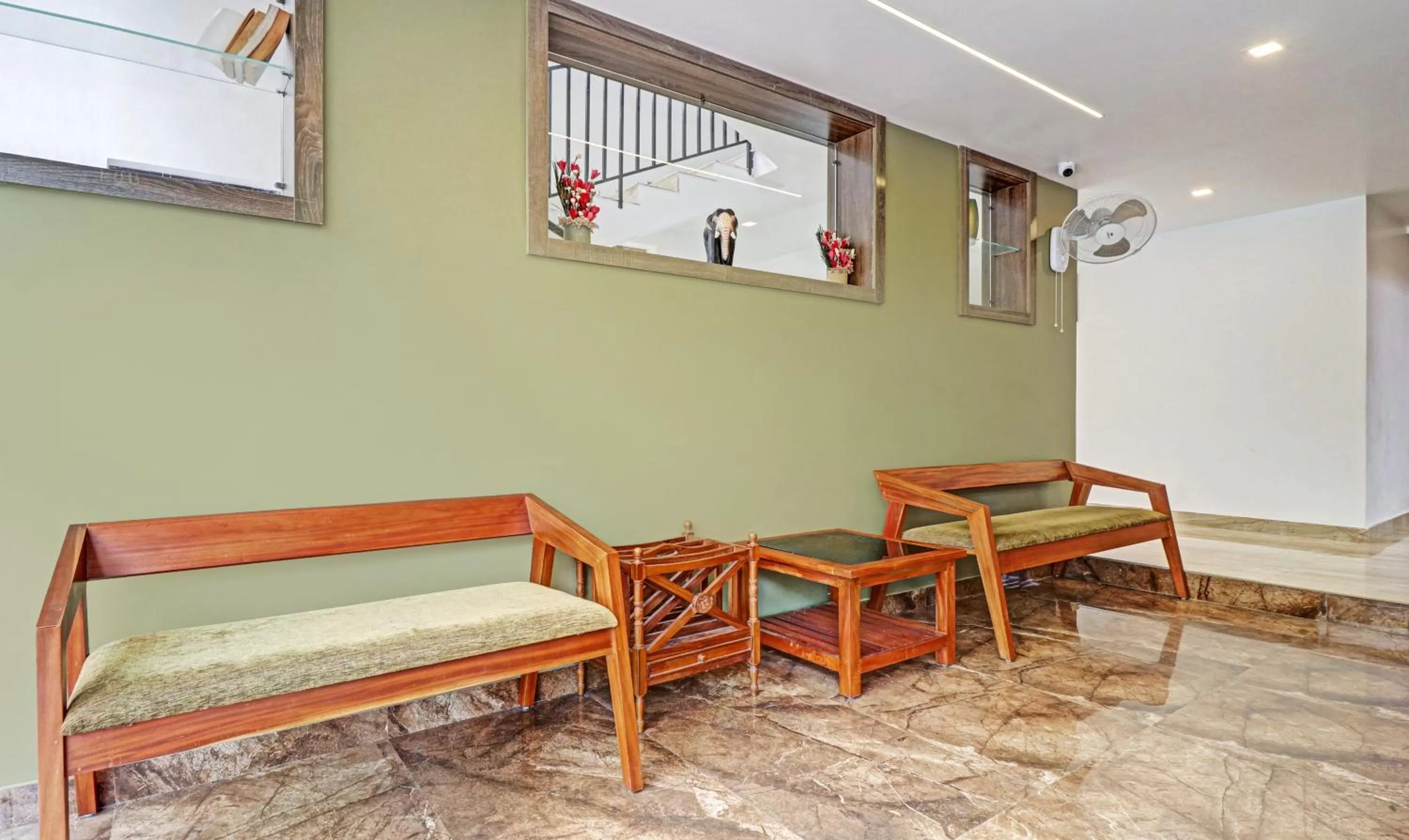 Seating area in Treebo Trend Sreepathi Mayoogha