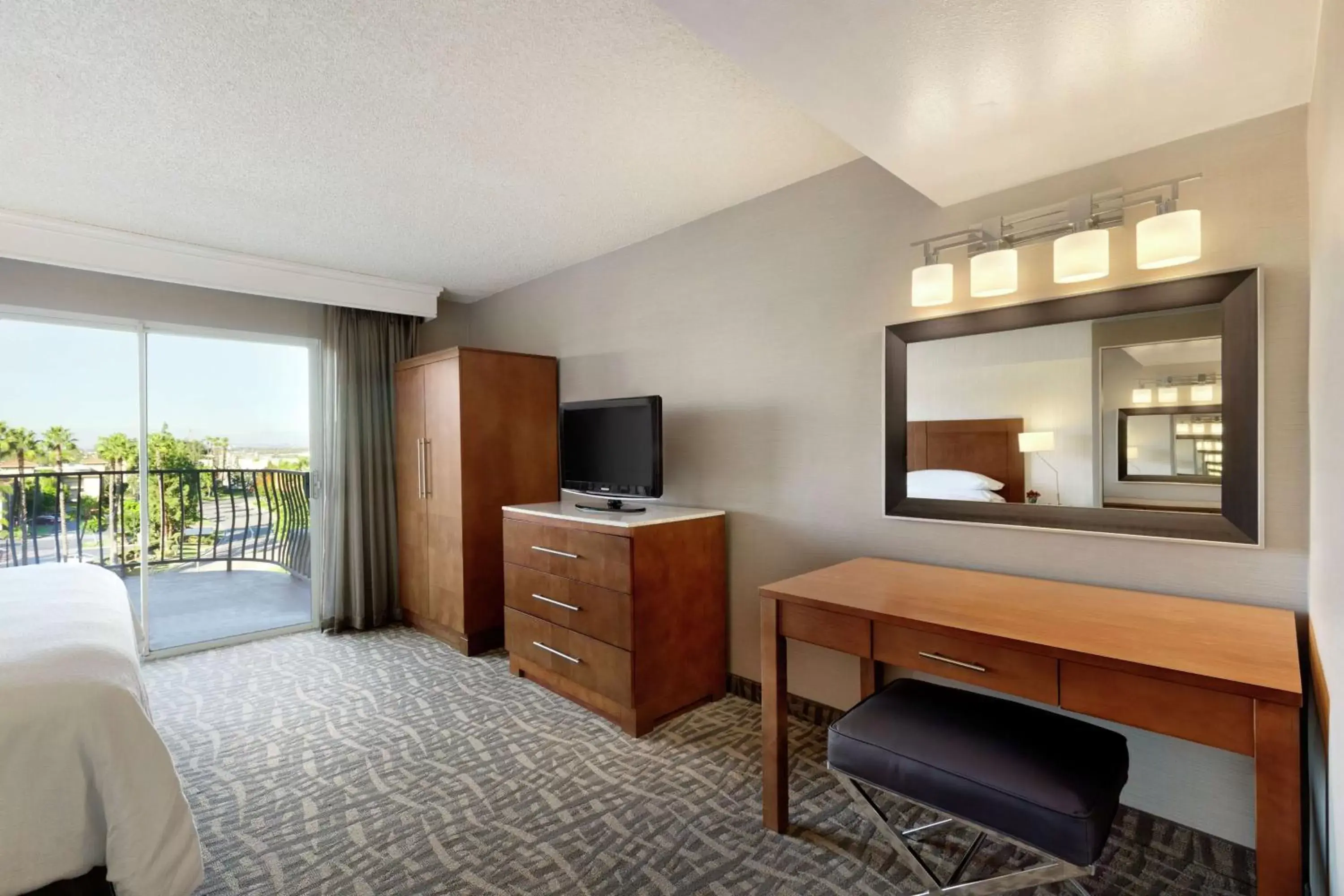 Bedroom, TV/Entertainment Center in Embassy Suites by Hilton Santa Ana Orange County Airport