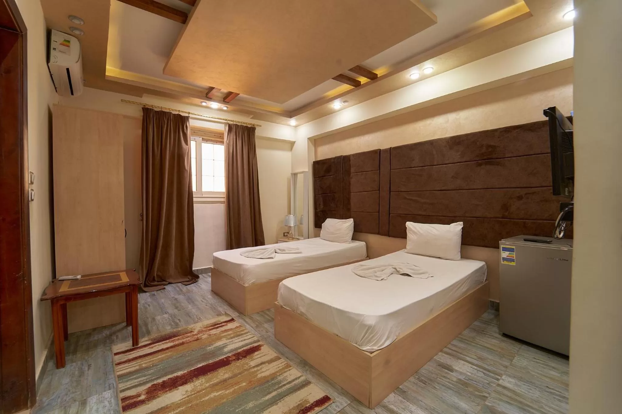 Photo of the whole room, Bed in Gardenia Inn Hotel