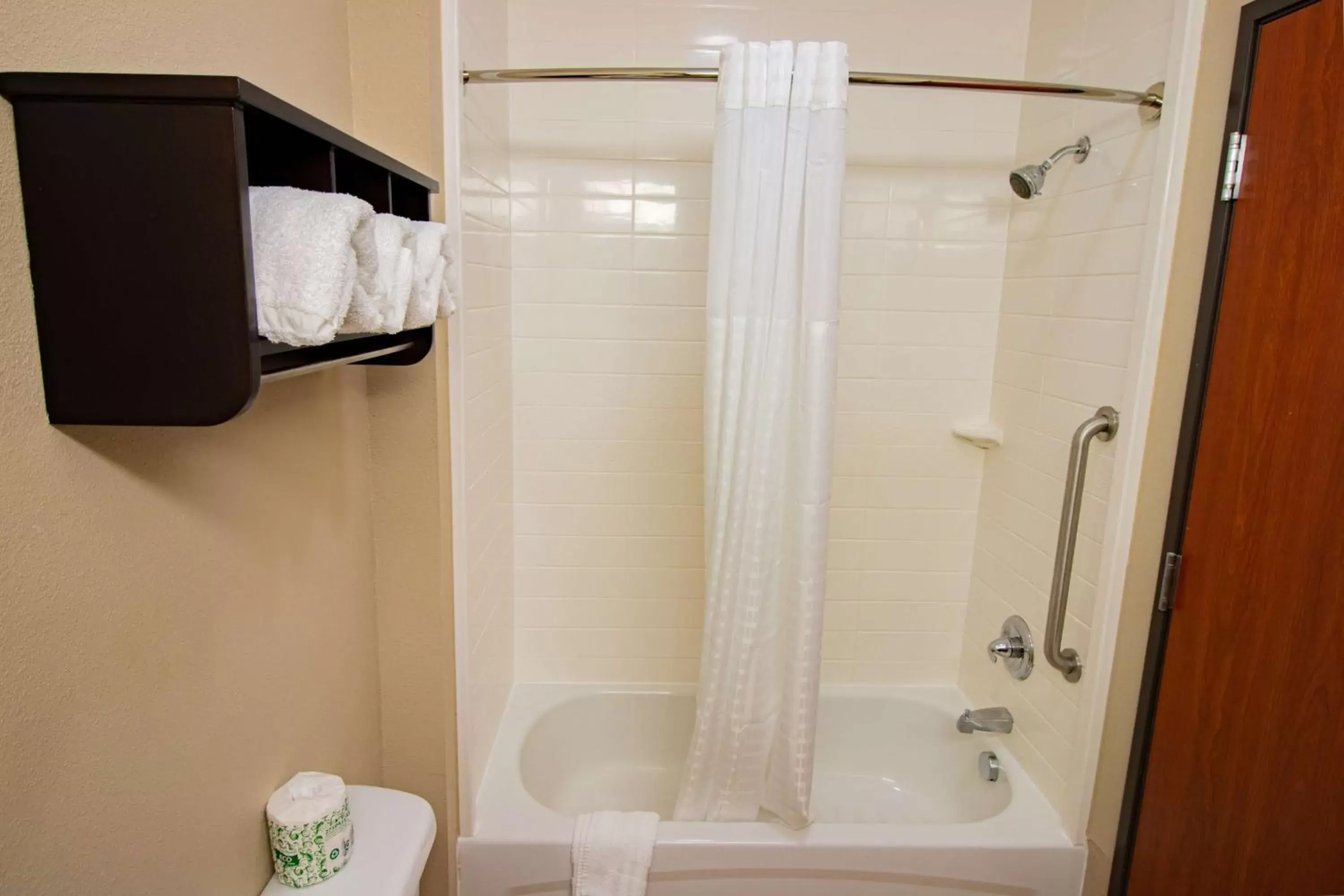 Bathroom in SureStay Plus Hotel by Best Western Owasso Tulsa North