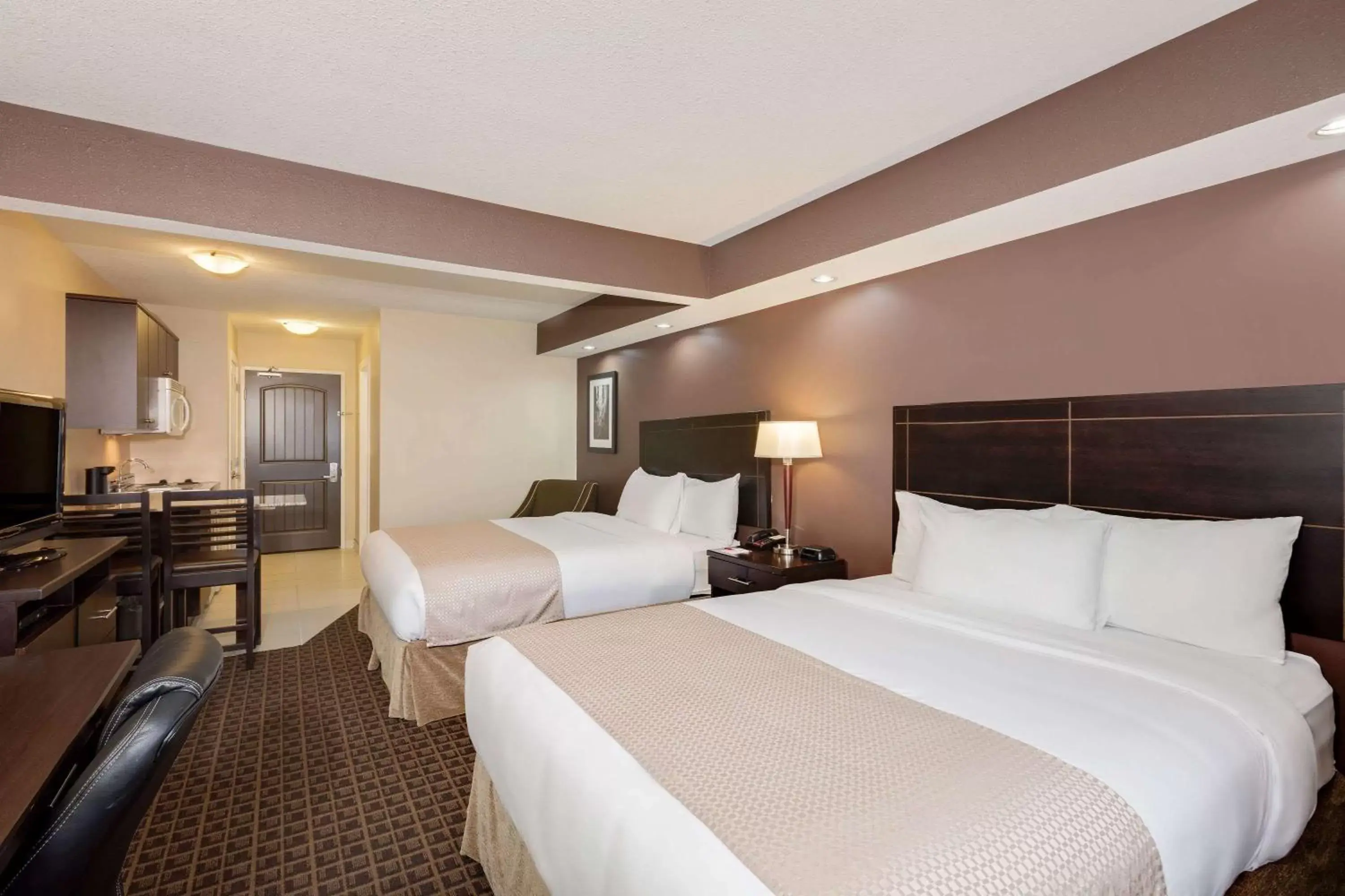 Photo of the whole room, Bed in Ramada by Wyndham Cold Lake