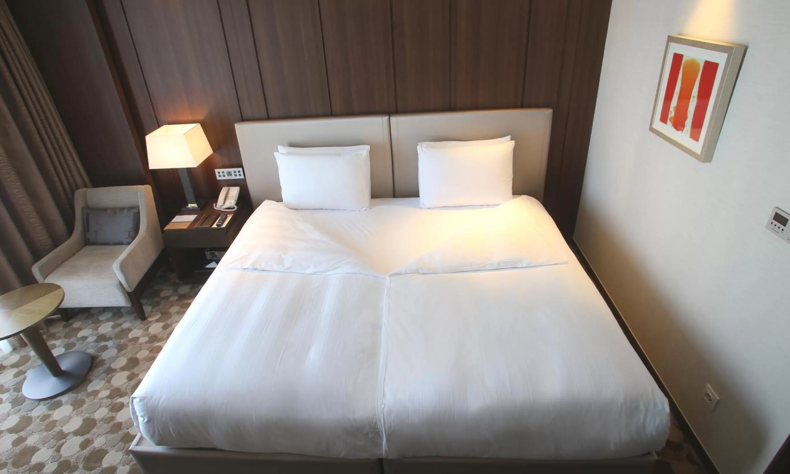 Bed in LOTTE CITY HOTEL Daejeon
