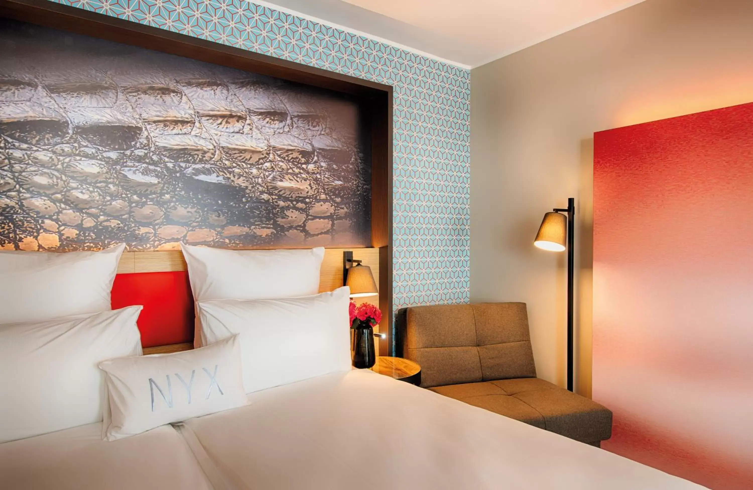 Photo of the whole room, Bed in NYX Hotel Munich by Leonardo Hotels